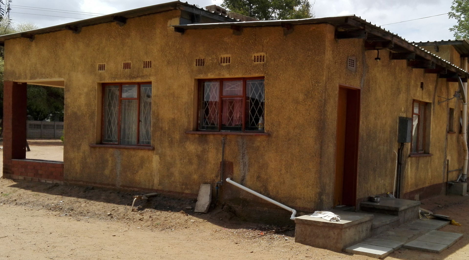 This is an image with the theme "Home + Habitat in Africa" from: