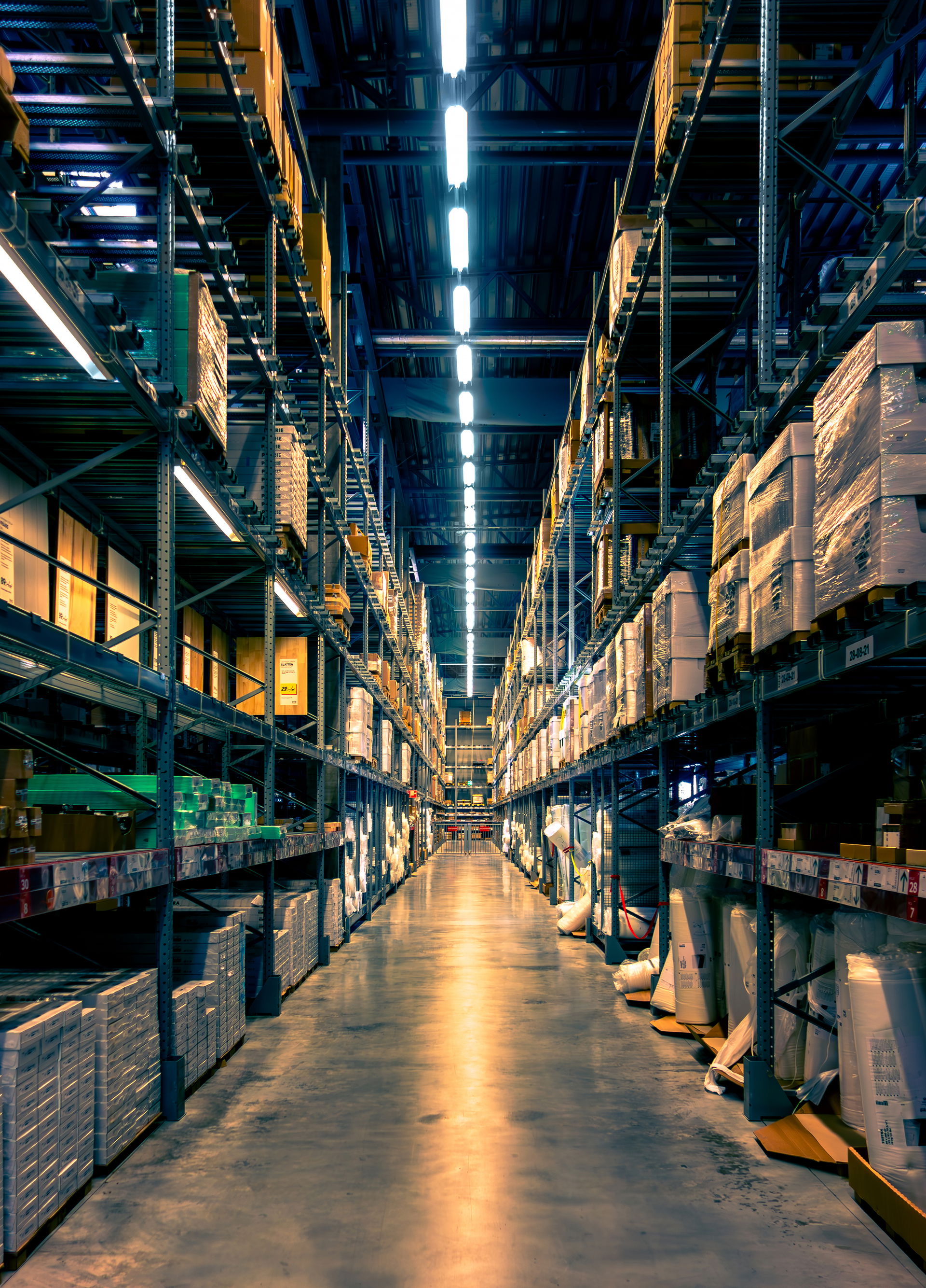 Self-serve aisle with pallet racking shelves in IKEA store in T…