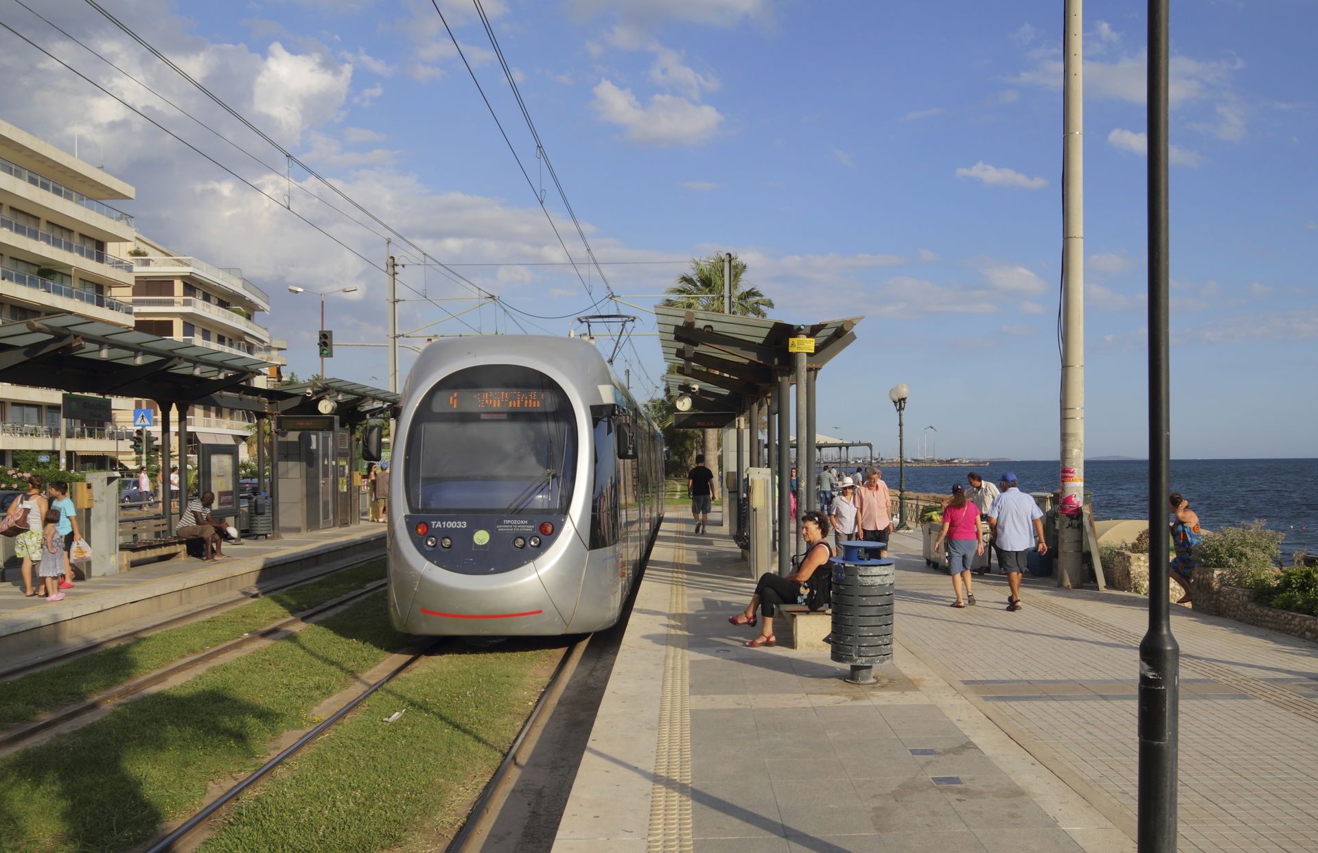 A tram at the stop «Flisvos» in Paleo Faliro (Attica, Greece)