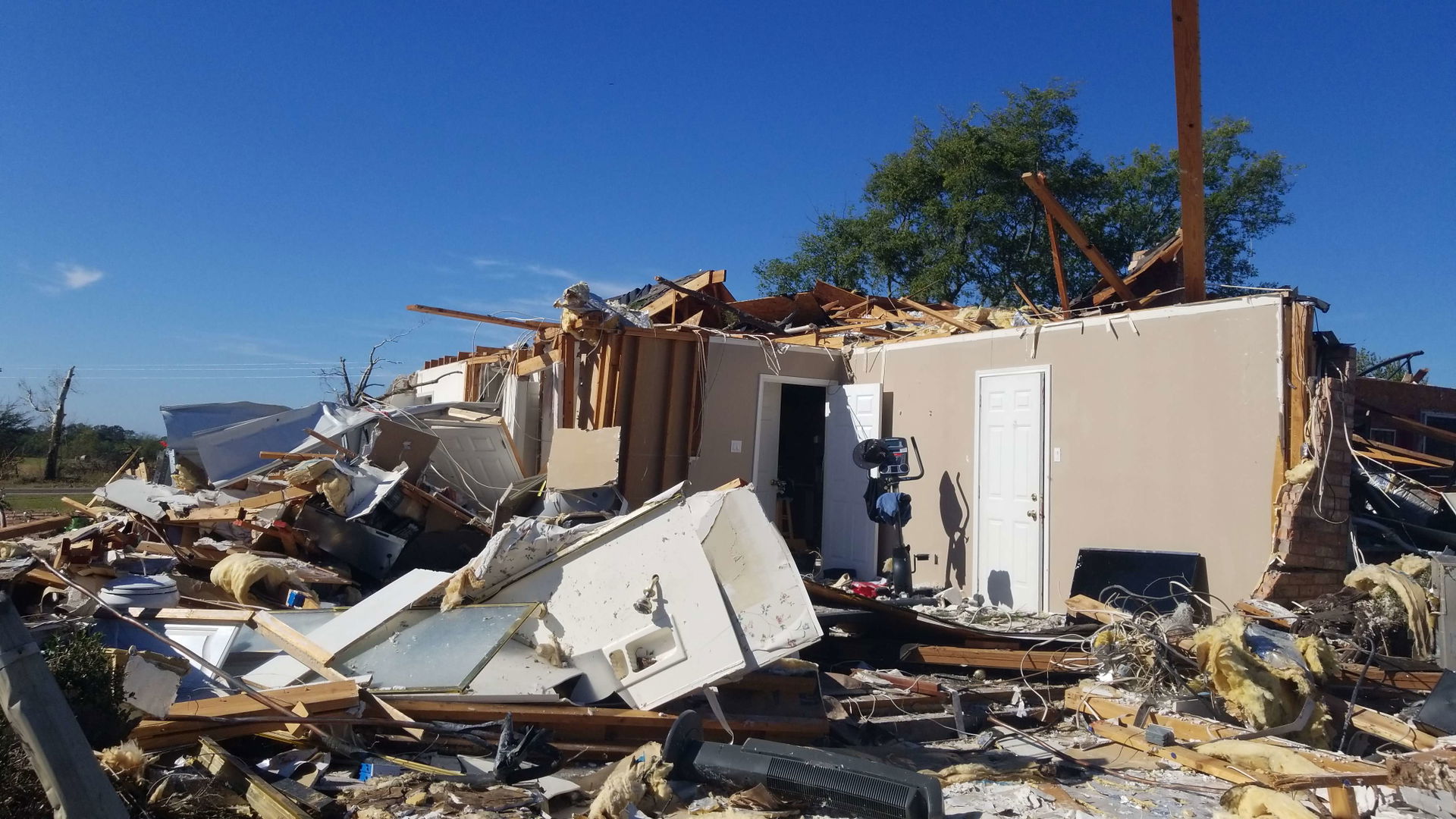A home that was heavily damaged by an EF2 tornado southwest of …