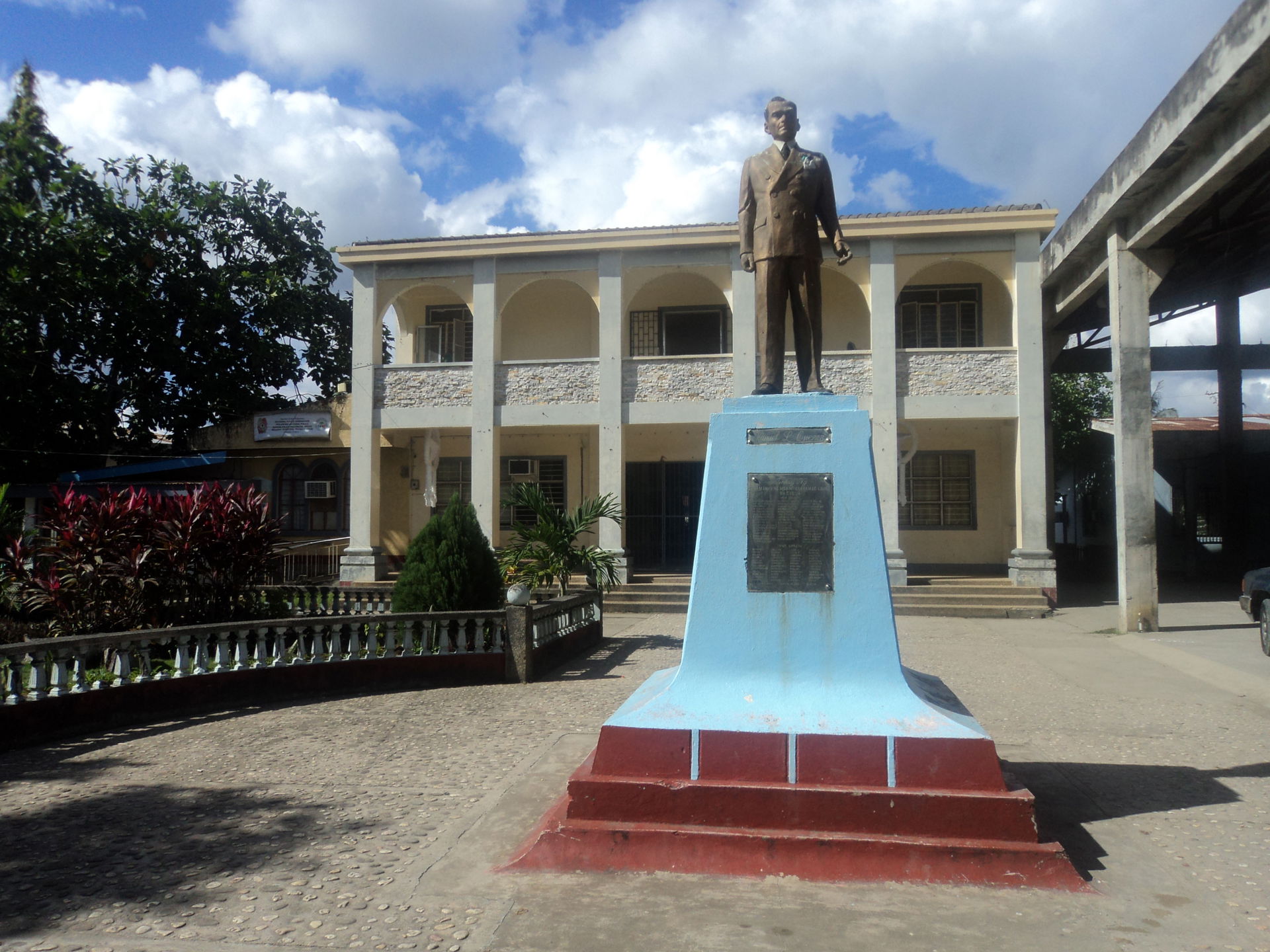 Monument of Manuel L. Quezon in front of the town hall of Mulan…