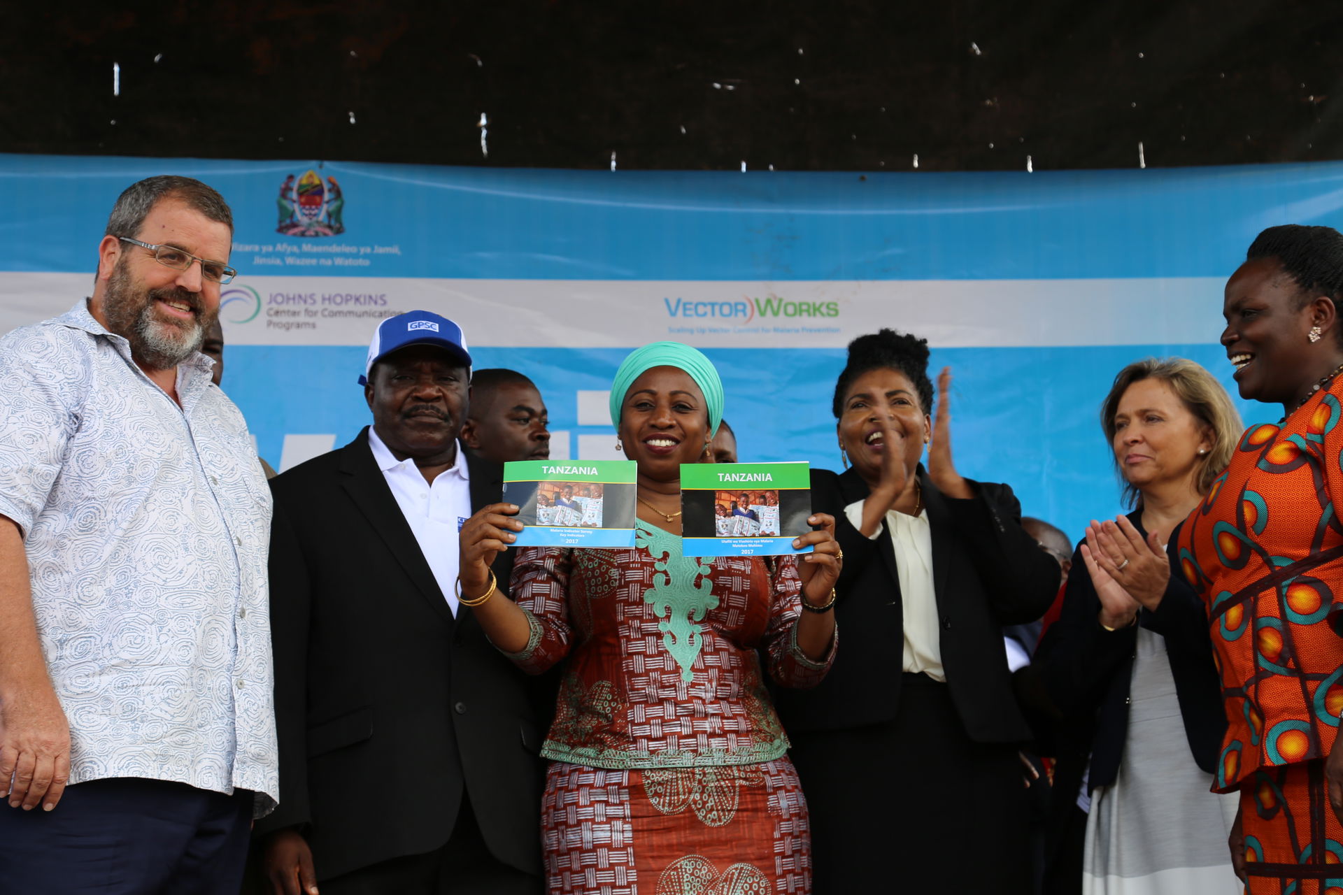 Hon. Minister of Health Ummy Mwalimu holds up the 2017/18 Tanza…
