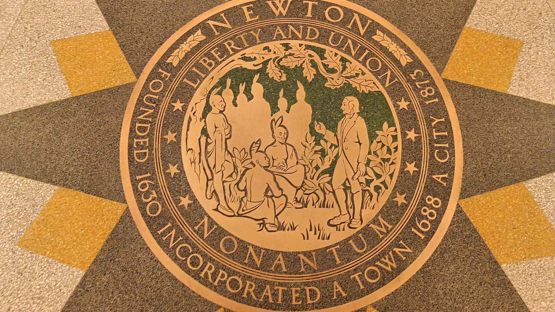 City seal of Newton, Massachusetts depicting John Eliot preachi…