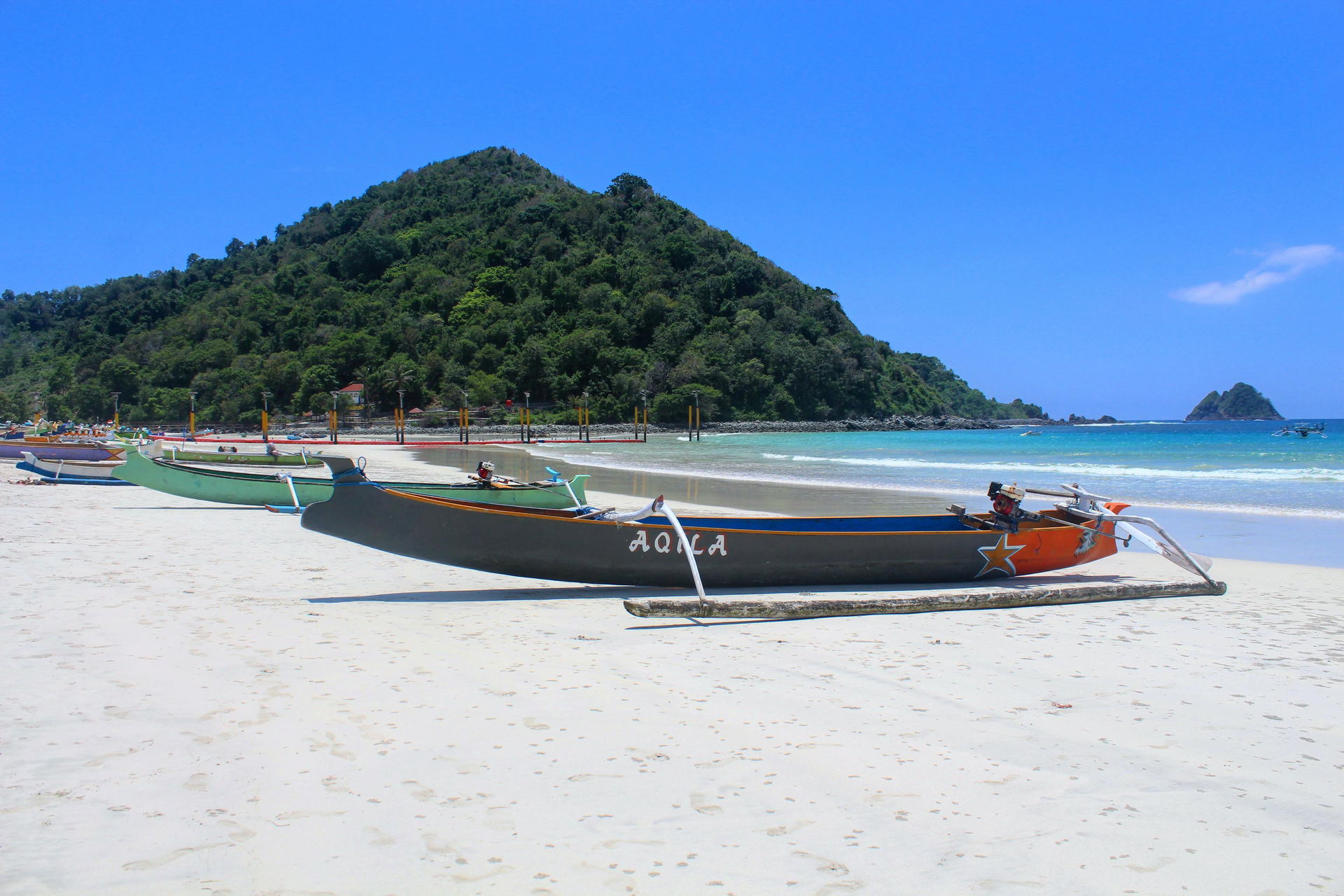a fisherman boat that was stopping at the beach of Selong Belan…