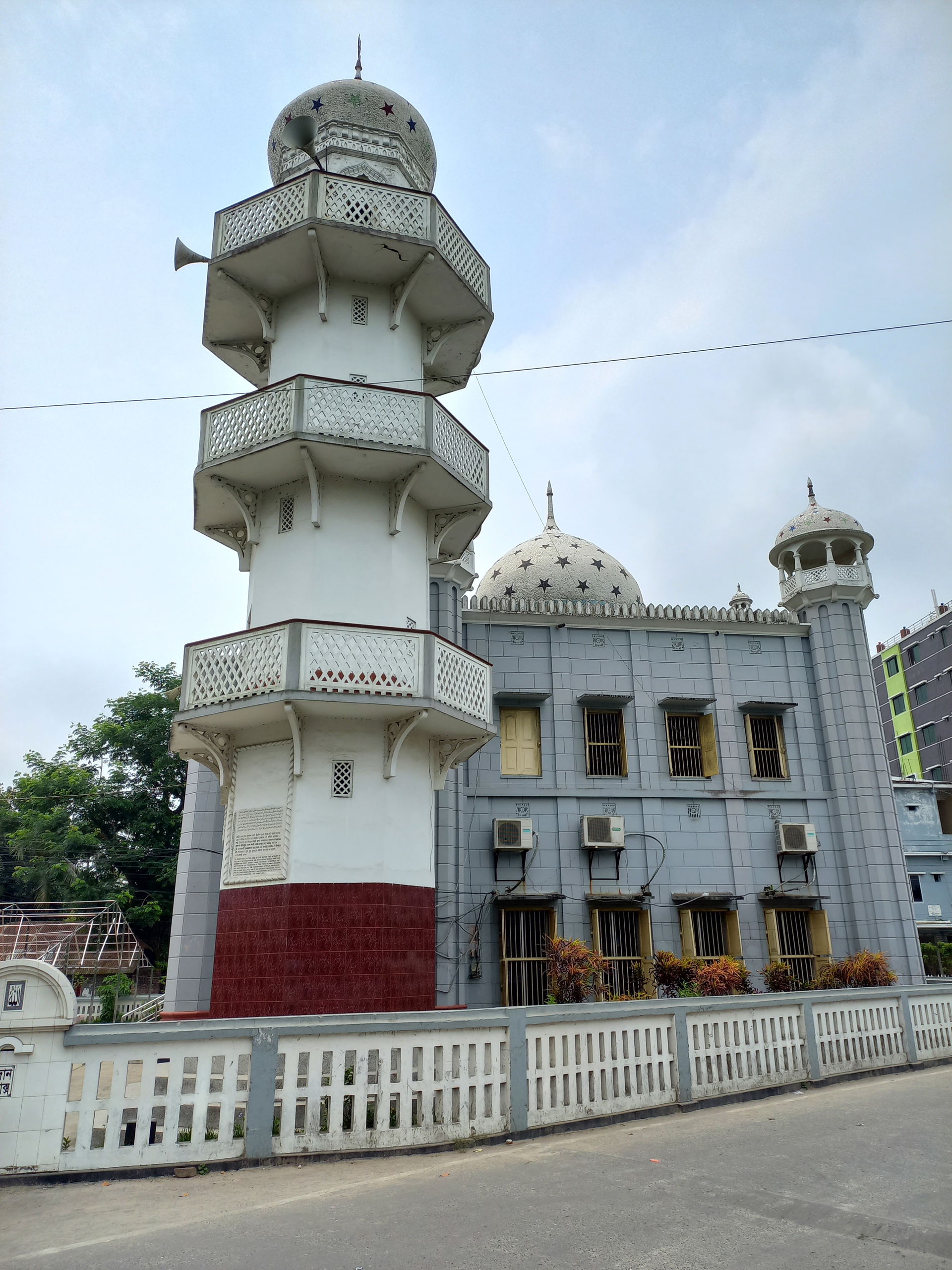 The image represents the dome and the minaret of Gopalganj Dist…