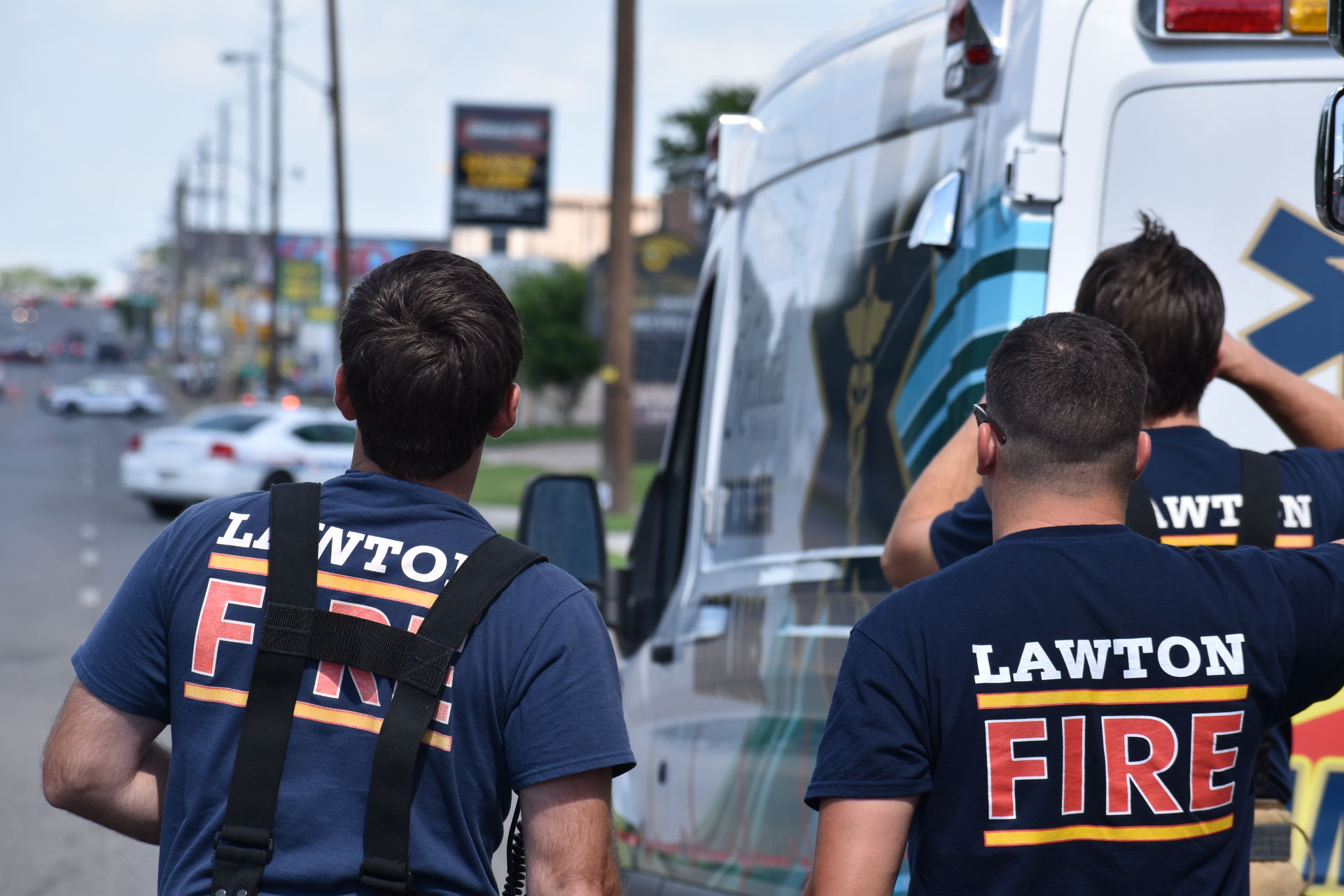 Members of the Lawton Fire Department observe the scene during …