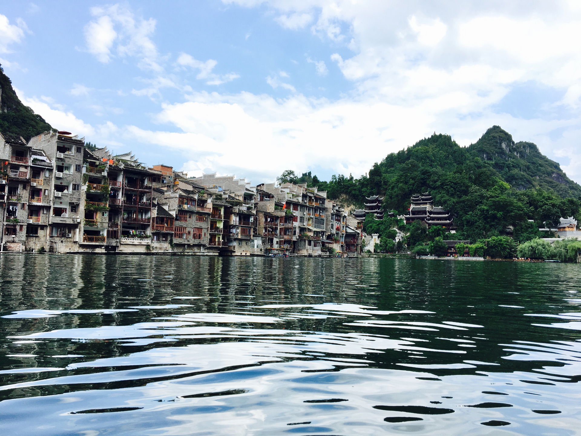 Residential buildings alongside the Wuyang River in Zhenyuan An…