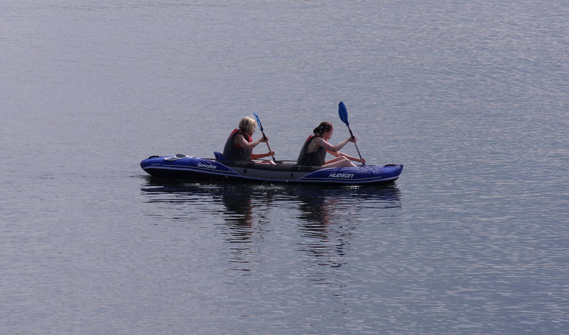 Two women in a boat on Lake Windermere, near Ambleside.