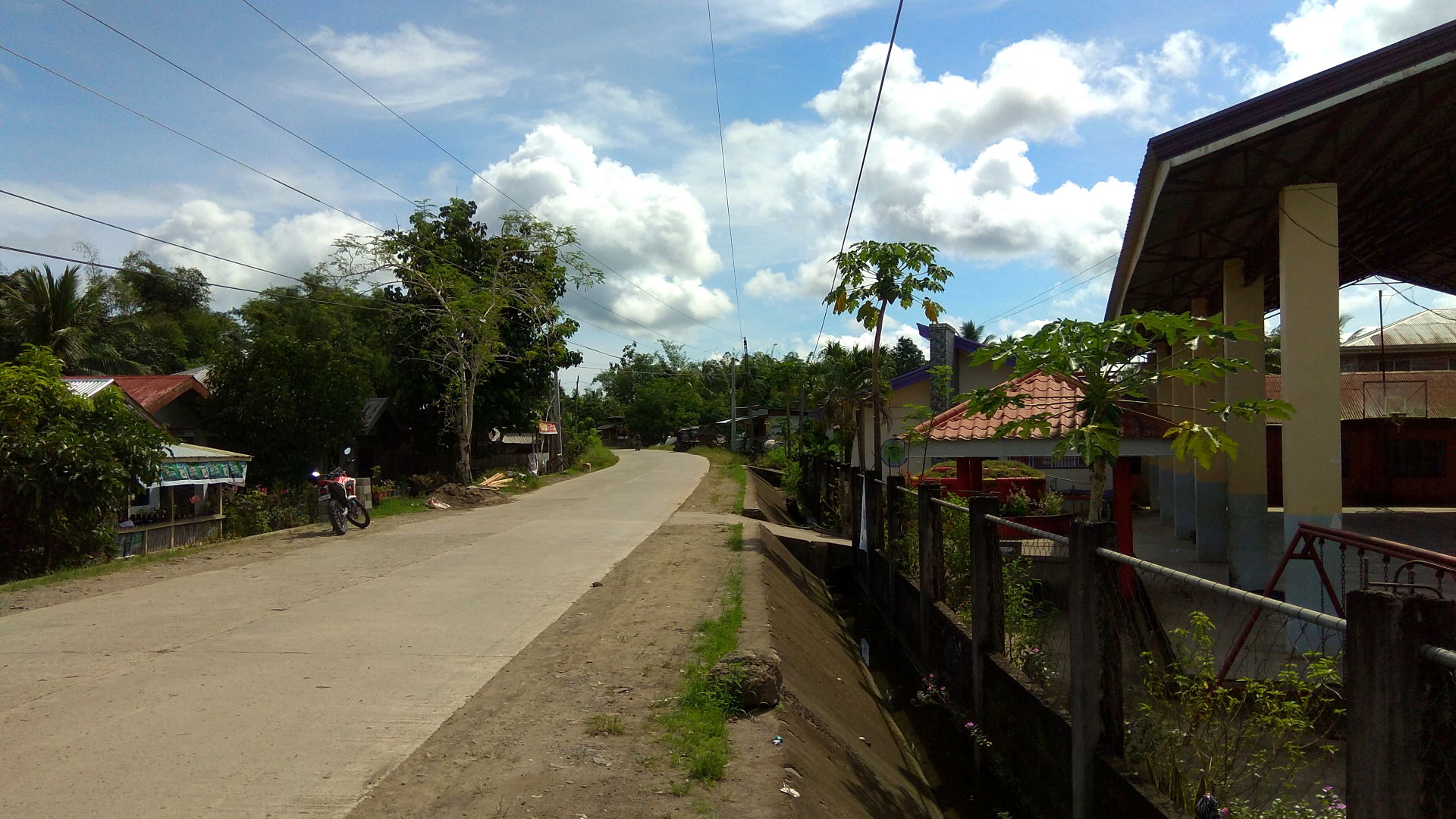 The photo depicts the view of the road between Siay and Payao i…