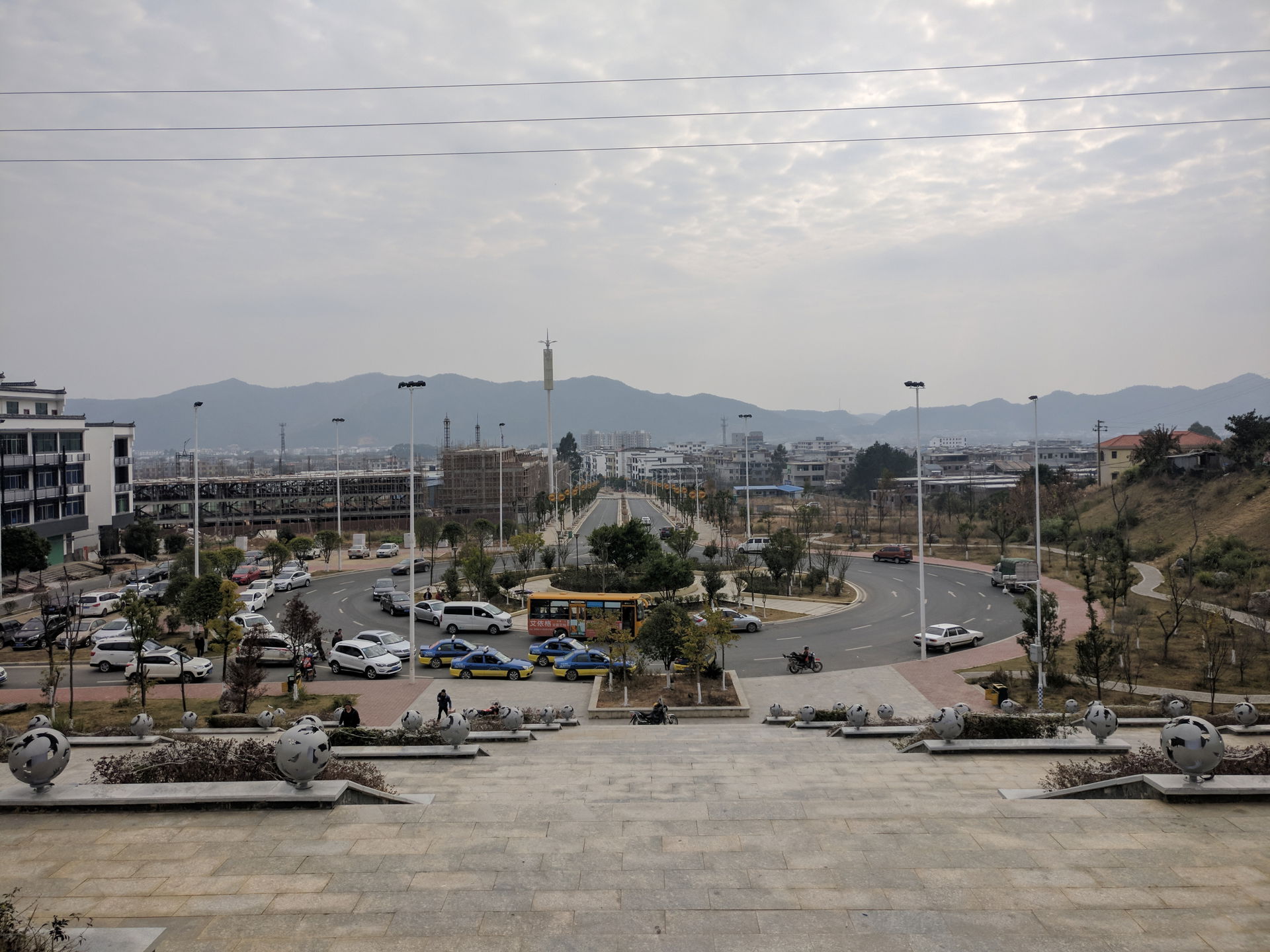 The square and the bus terminus in front of Longnan Railway Sta…