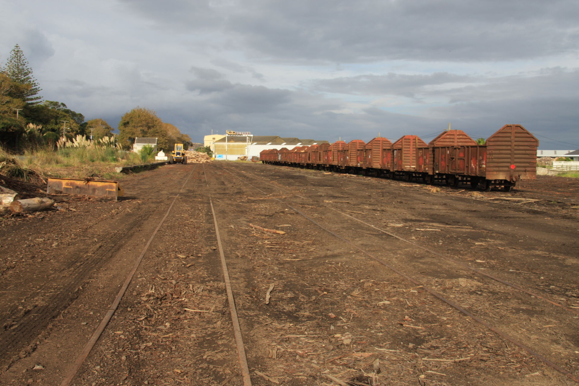 Old 4-wheel timber wagons waiting to be loaded in the yard at D…