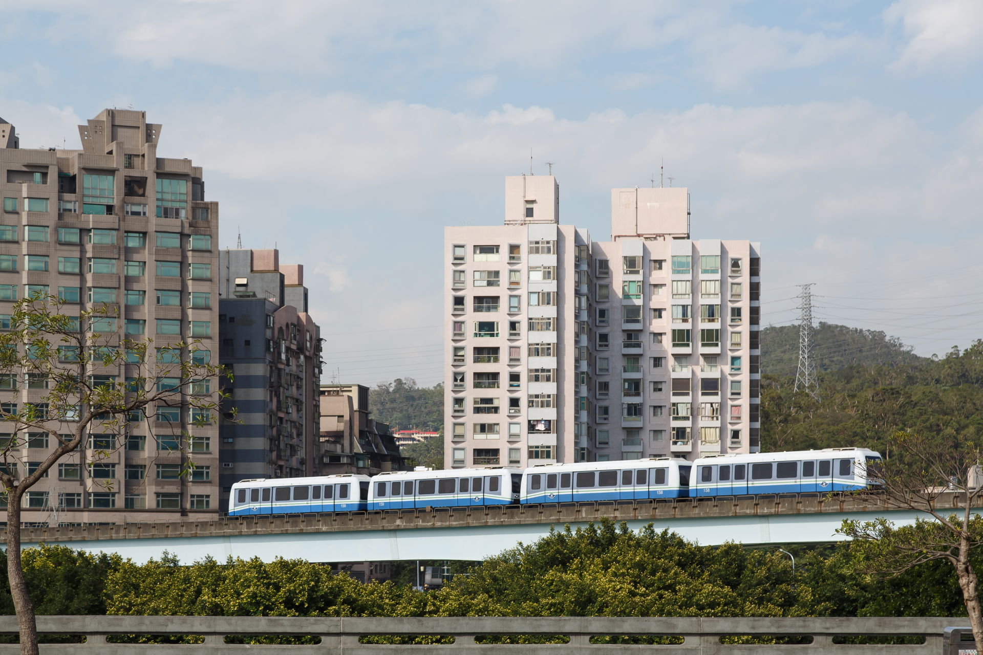 Taipei, Taiwan: Taipei Metro Wenshan Line. A train is moving fr…