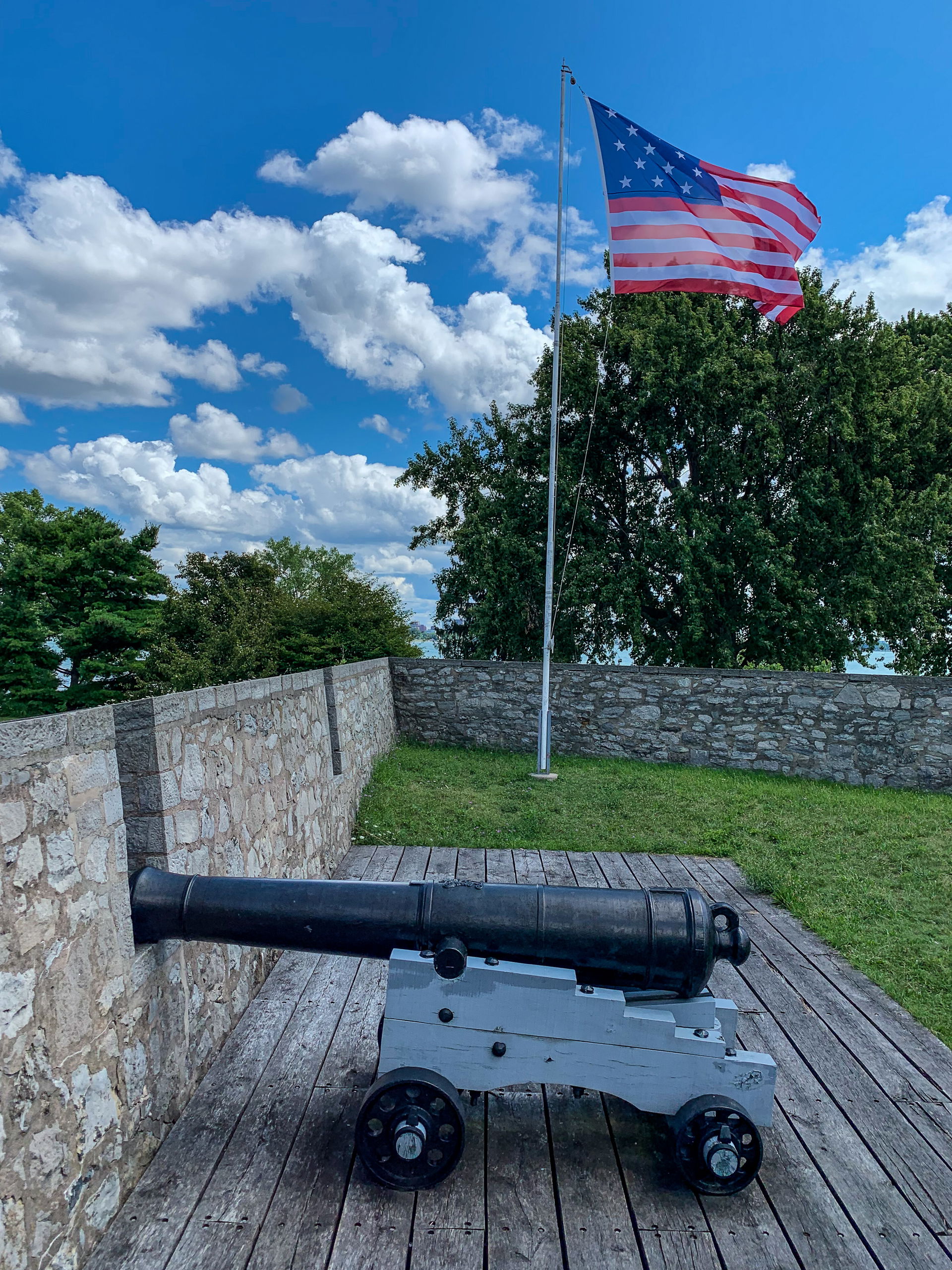 ca 1812 US flag and cannon at Old Fort Erie, Ontario, Canada.