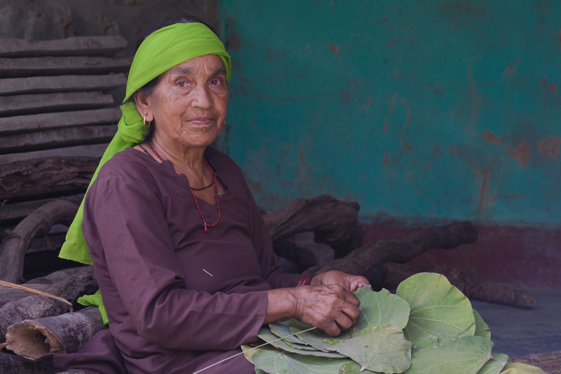 Ramdei, a resident of Nadli, Kangra district, making leaf plates