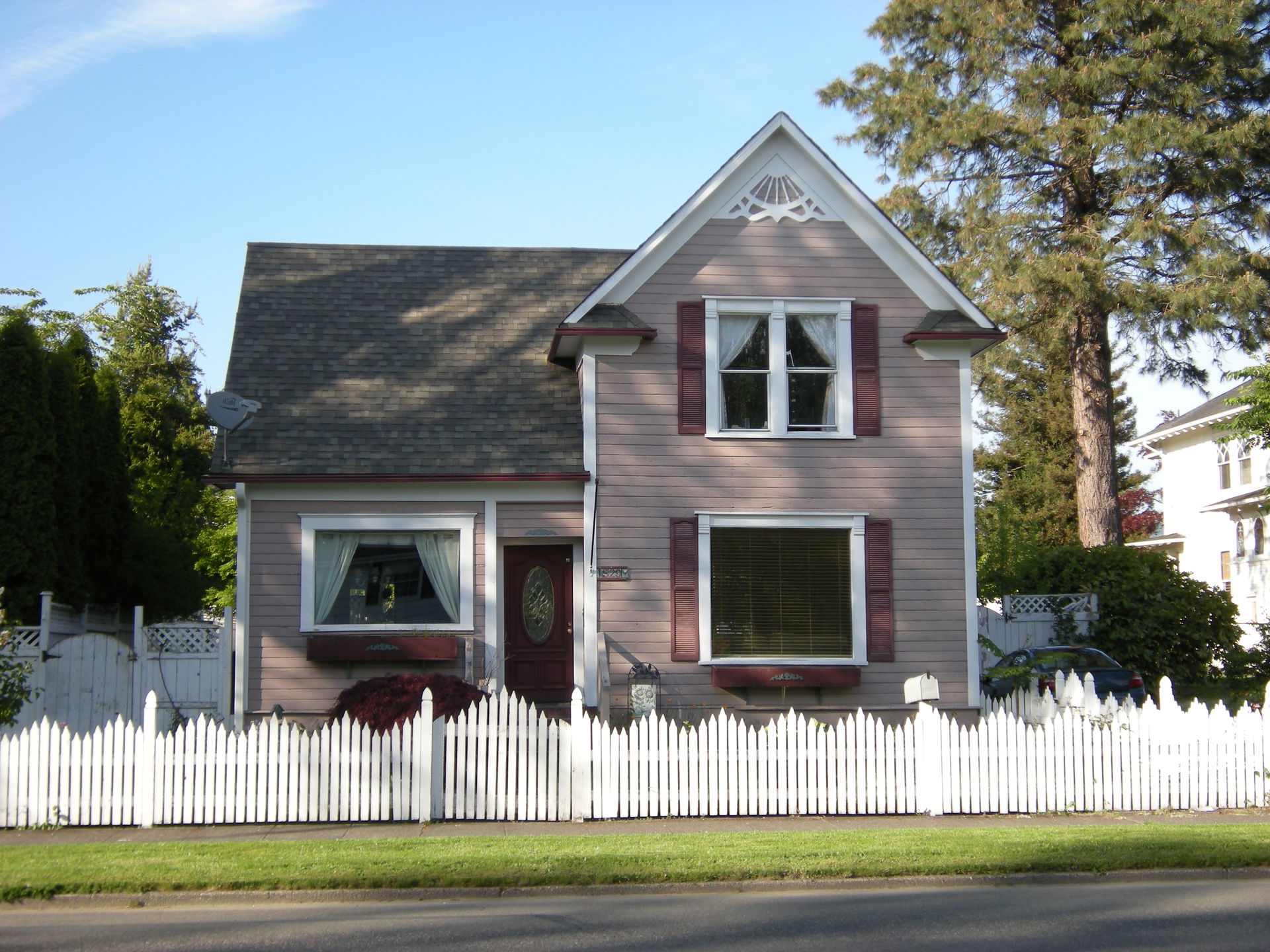 A "Princess Anne" (a modest version of Queen Anne) style home a…
