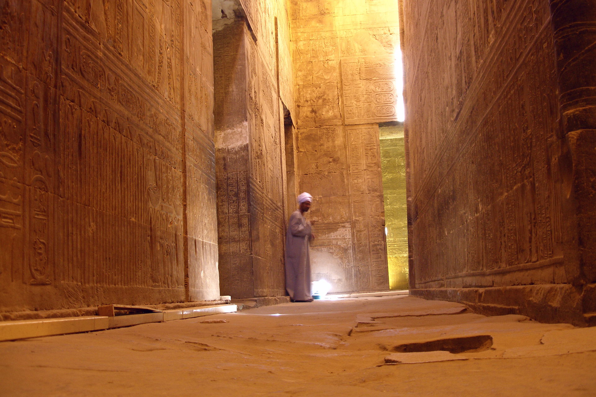 As you roam through Edfu temple dark halls and sanctuaries an a…