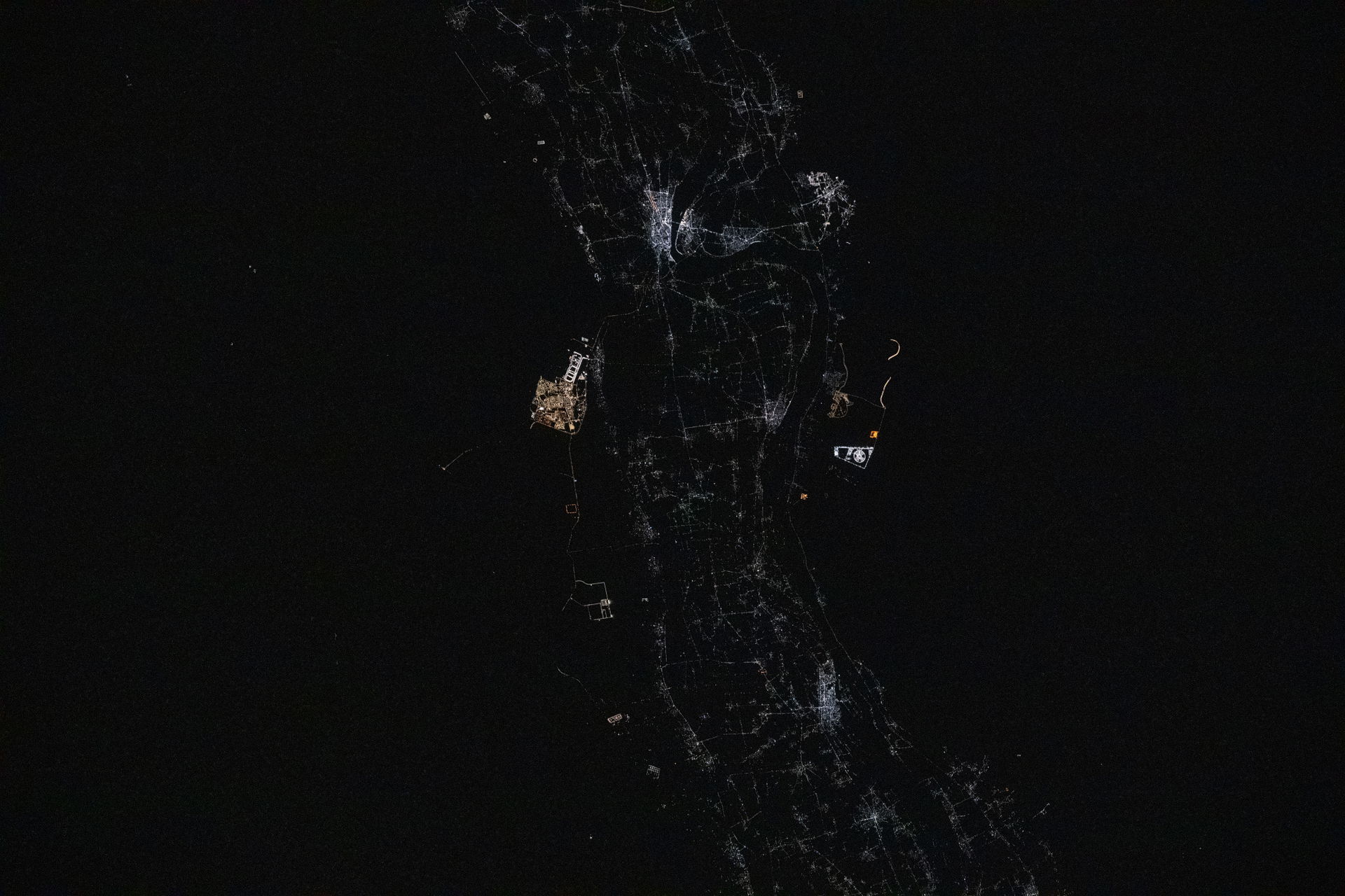 iss073e0134645 (May 22, 2025) --- Sohag, Egypt (top center), on…