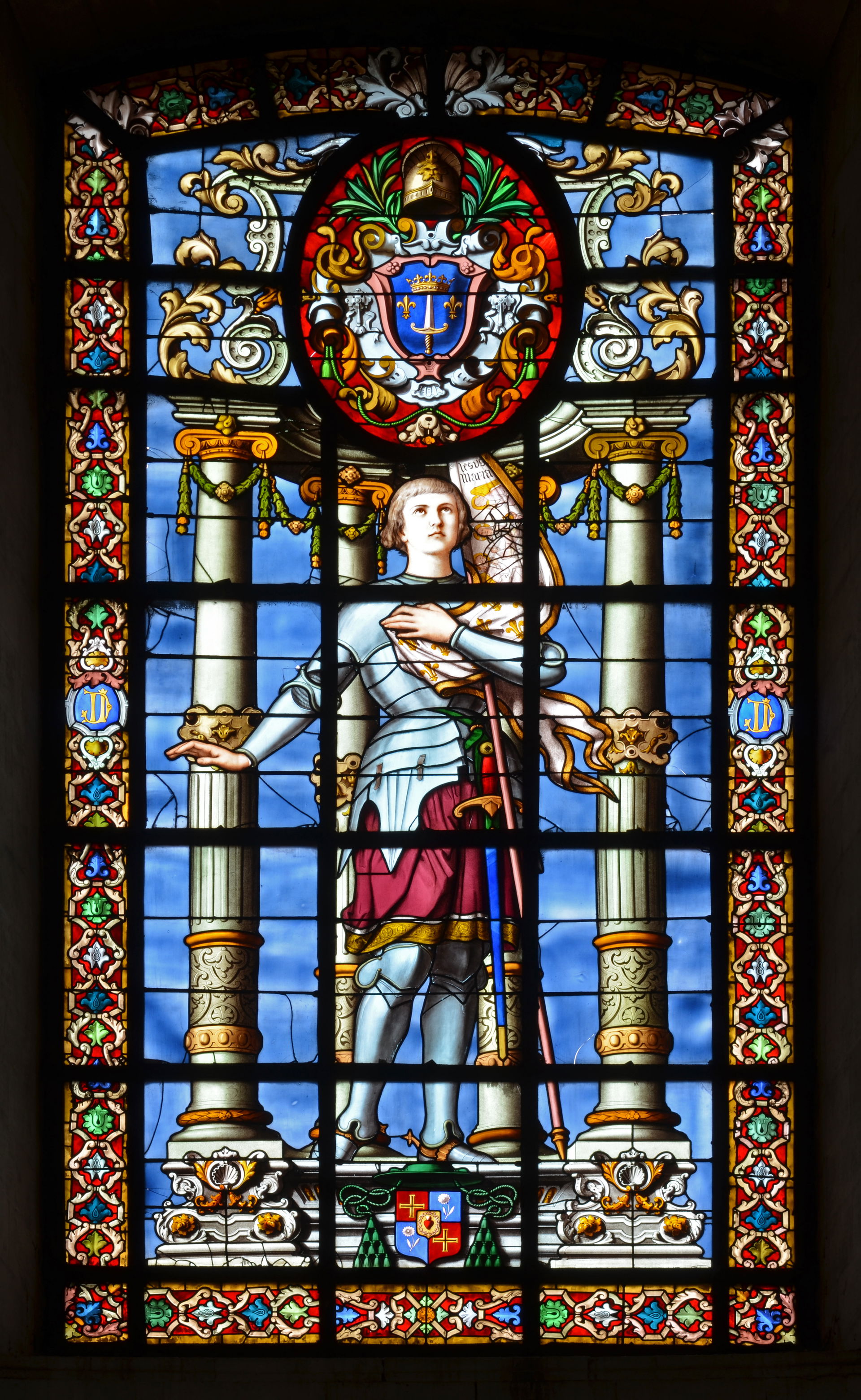 Stained glass window (1880) depicting Joan of Arc in La Rochell…