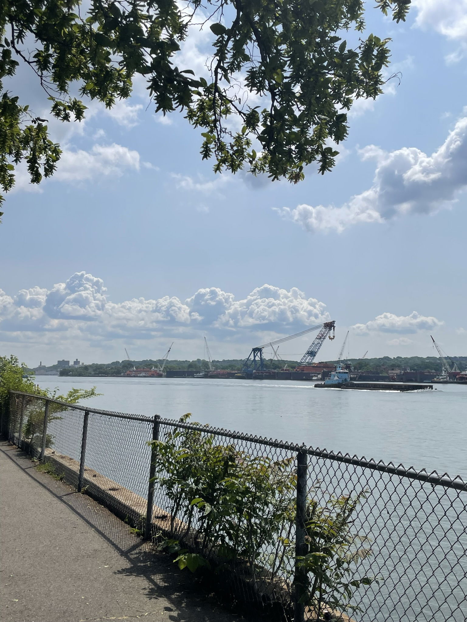 Dennis P Collins Park in Bayonne, New Jersey, with a shot overl…