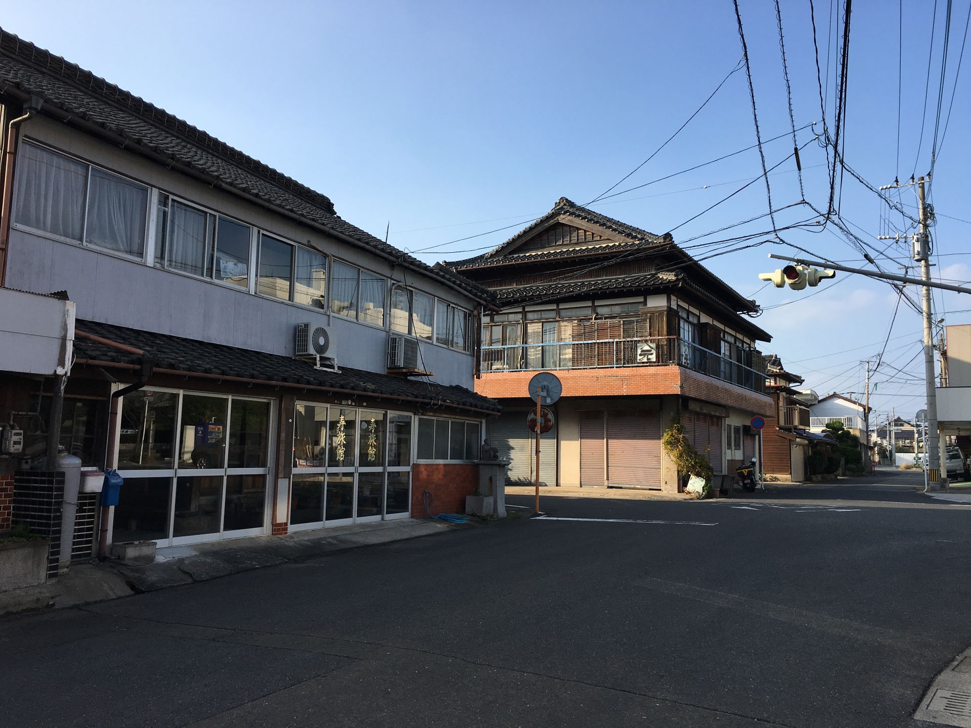 Buildings at an intersection of streets in Karatsu, Saga, Japan…