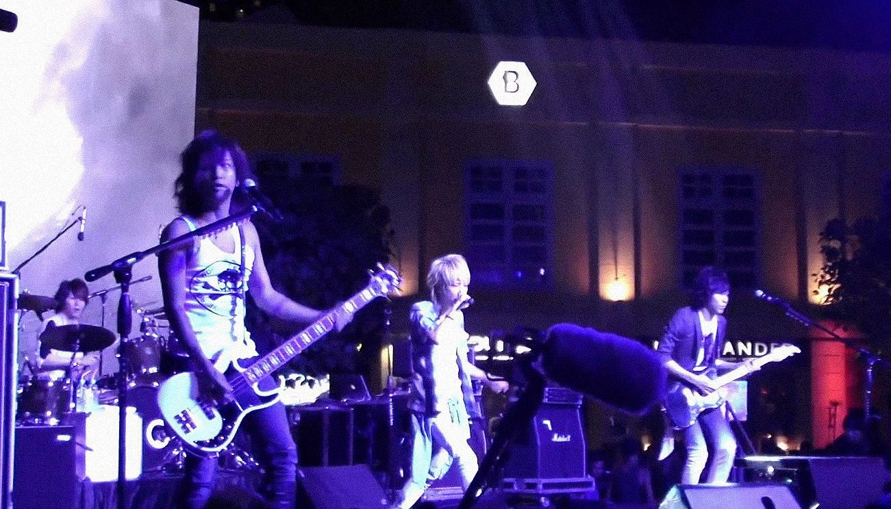 Sid performing in Singapore, in 2013.
