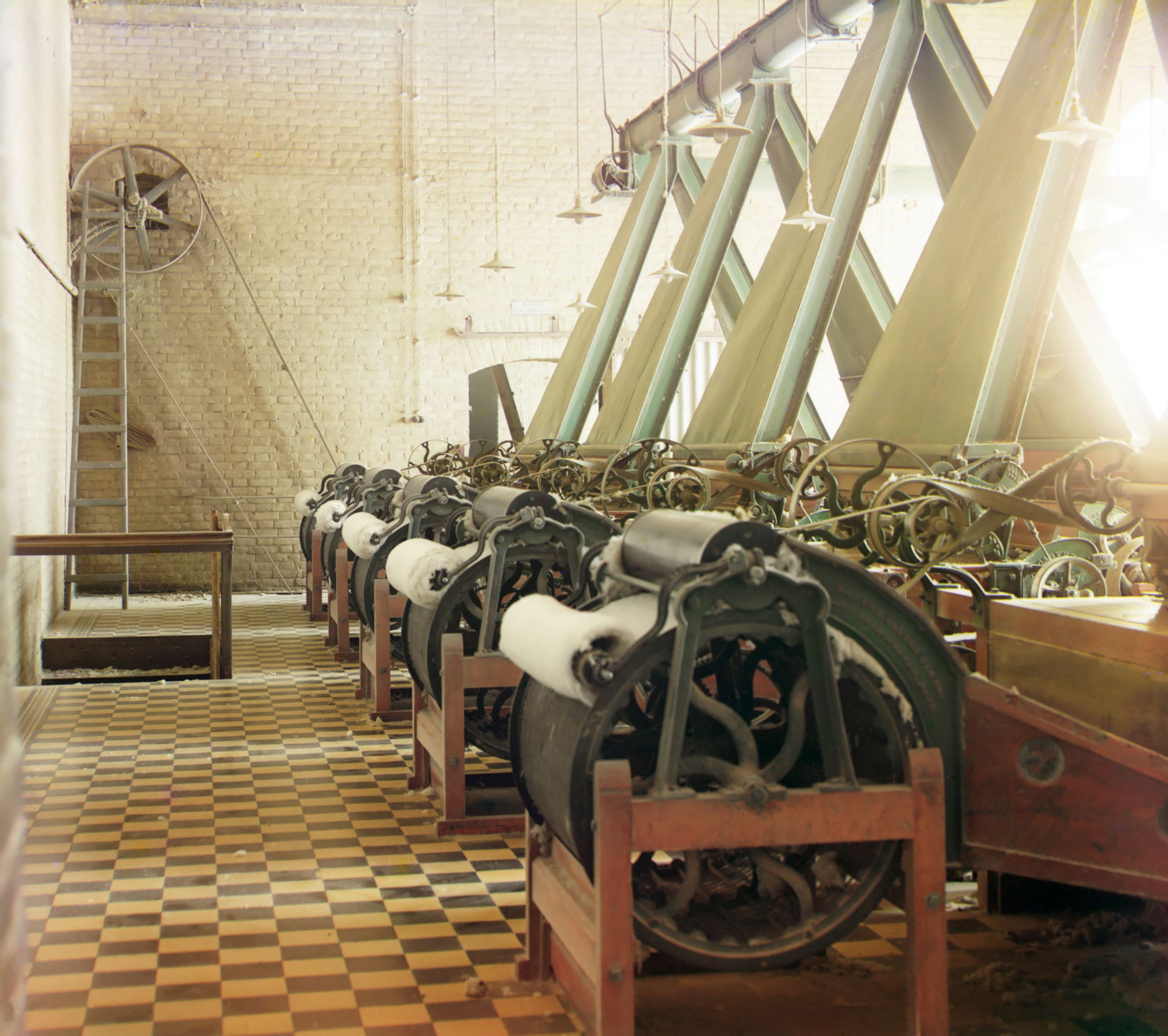 Original Description: Cotton textile mill interior with machine…