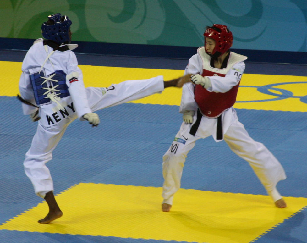2008 Summer Olympics Taekwondo - Mildred Alango (KEN, blue) v. …