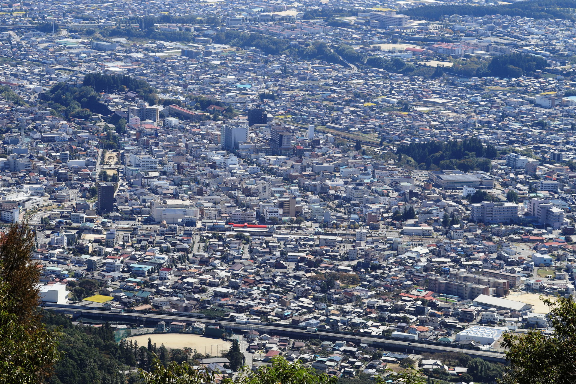 Iida City around Iida Station seen form Mount Kazakoshi (Mount …