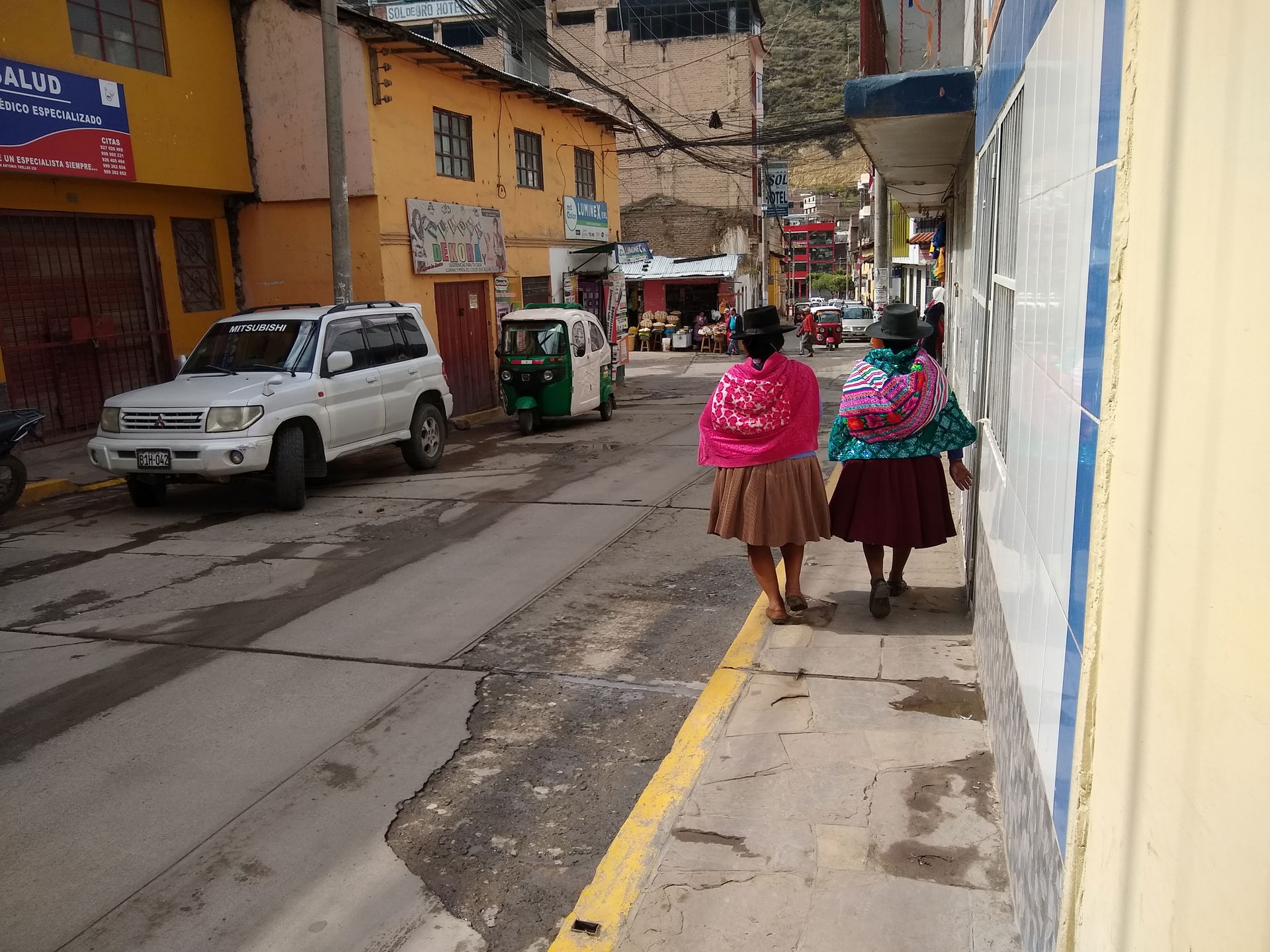Andahuaylas Peru- two women walking down street