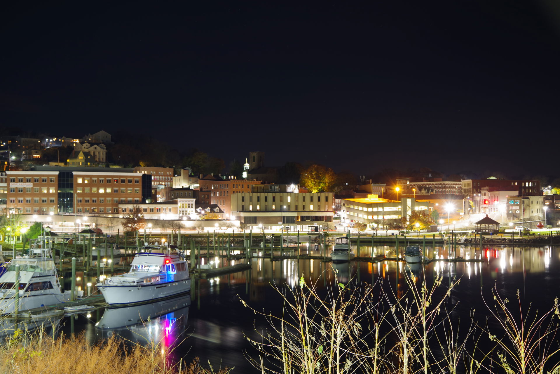 Norwich Connecticut as seen from across the harbor, at night