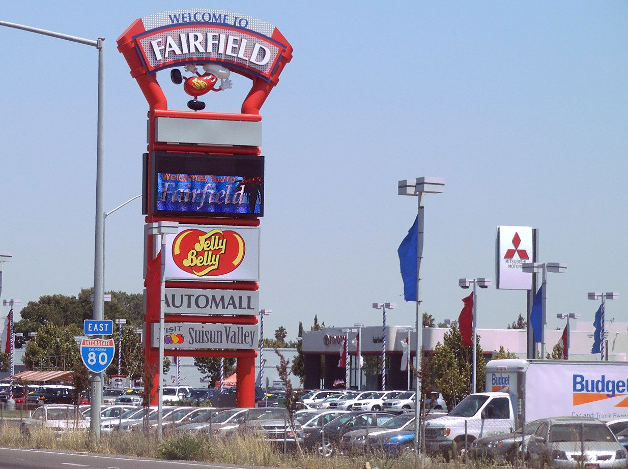 A sign next to northbound Interstate 80 which welcomes visitors…