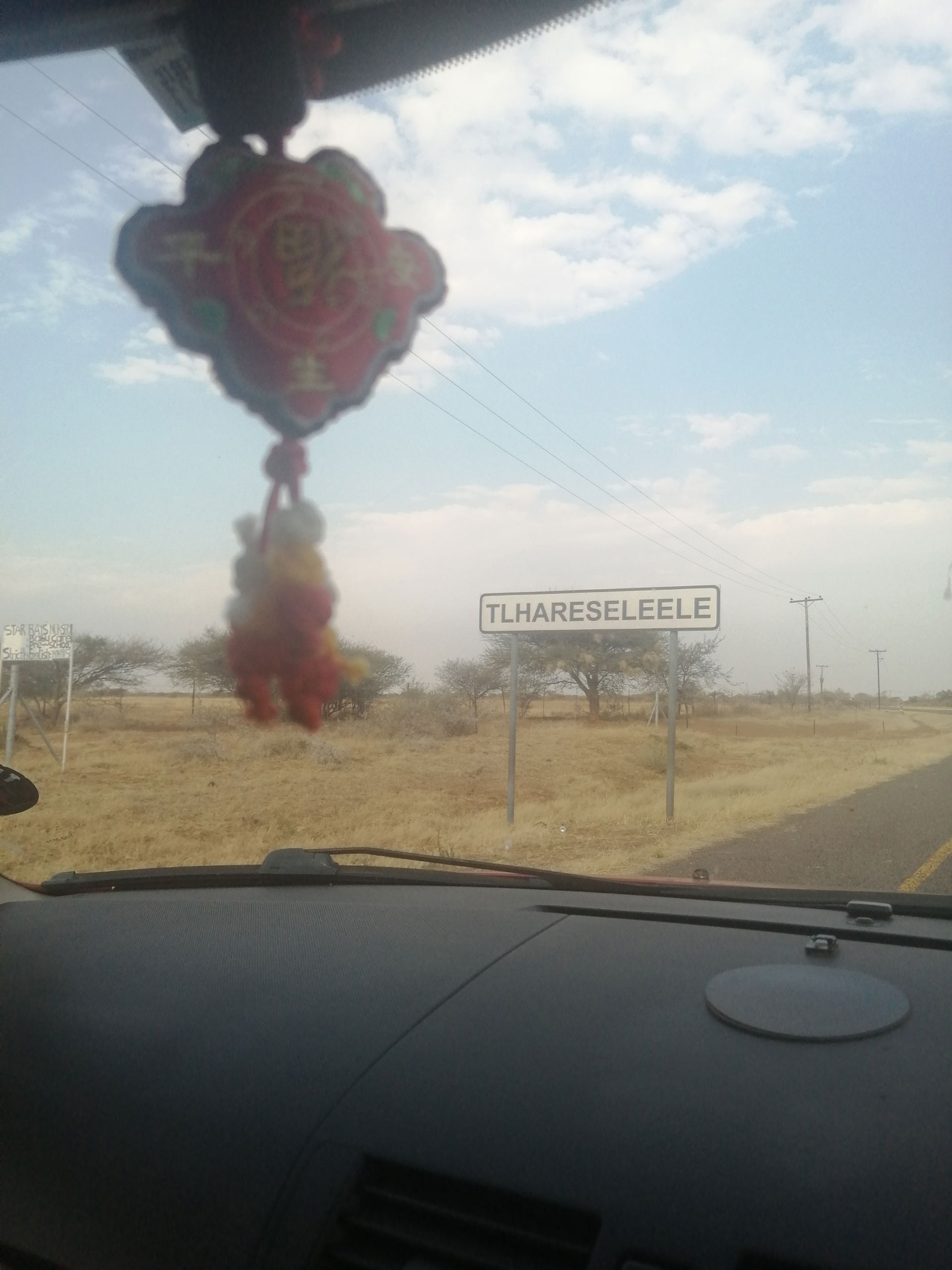 This picture is a sign board that shows the Tlhareseleele villa…