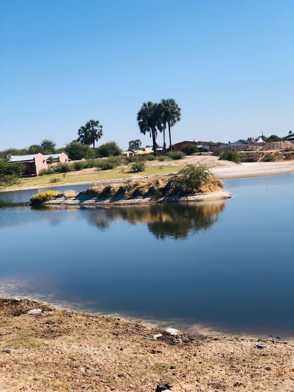 Water reflecting on a river in Eenhana village giving out a goo…