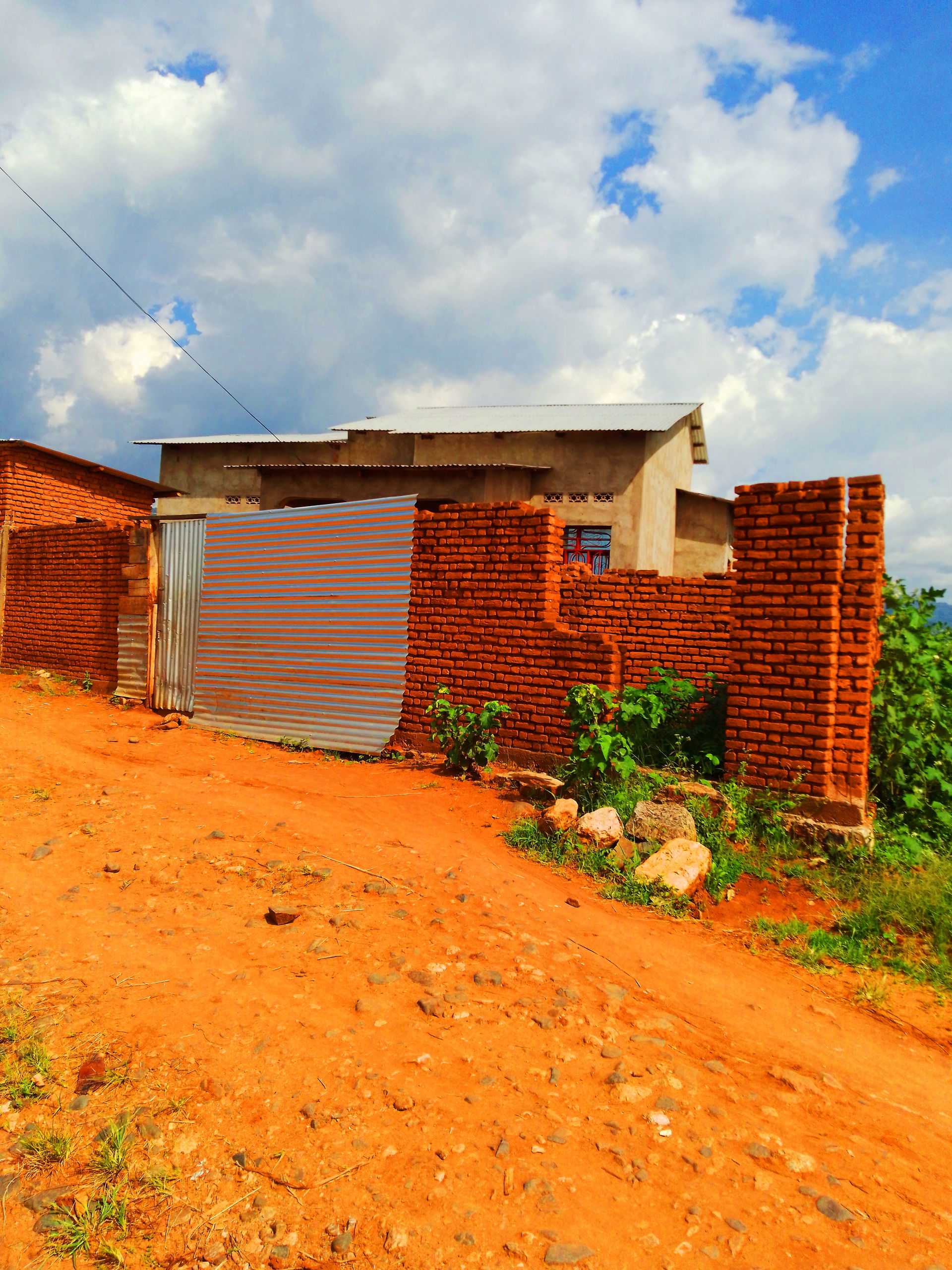 This is an image with the theme "Home + Habitat in Africa" from: