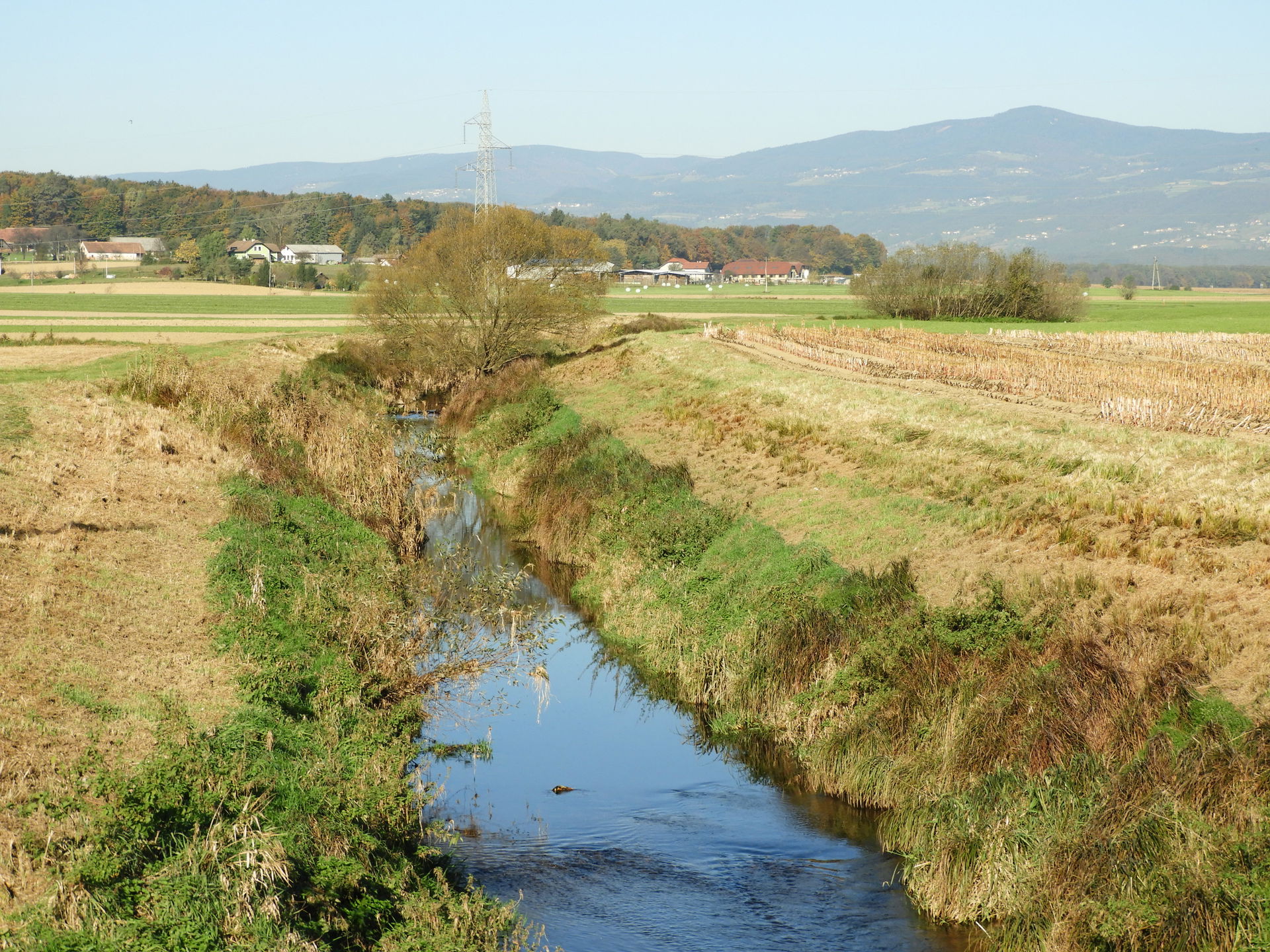 Regulated bed of the small Ložnica River near the village of Fa…