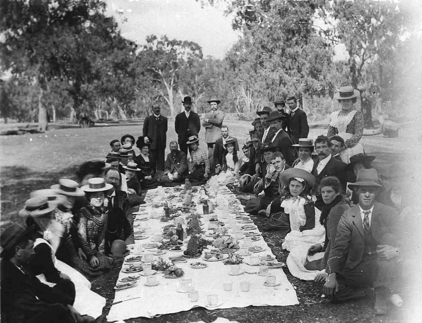 Mr and Mrs H McCutcheon (at end of cloth), Tilda McCutcheon, ag…