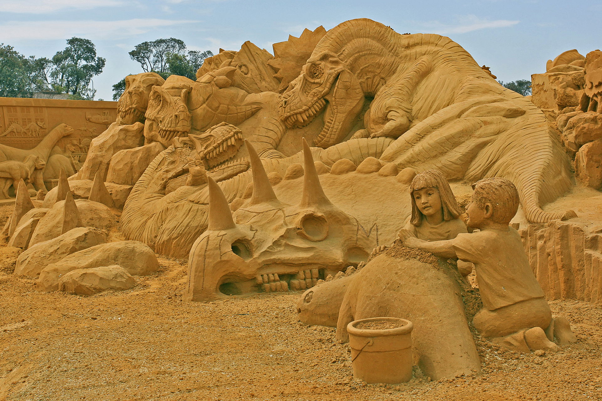 Dinosaur sand sculptures at the Sand Sculpting Australia "Dinos…