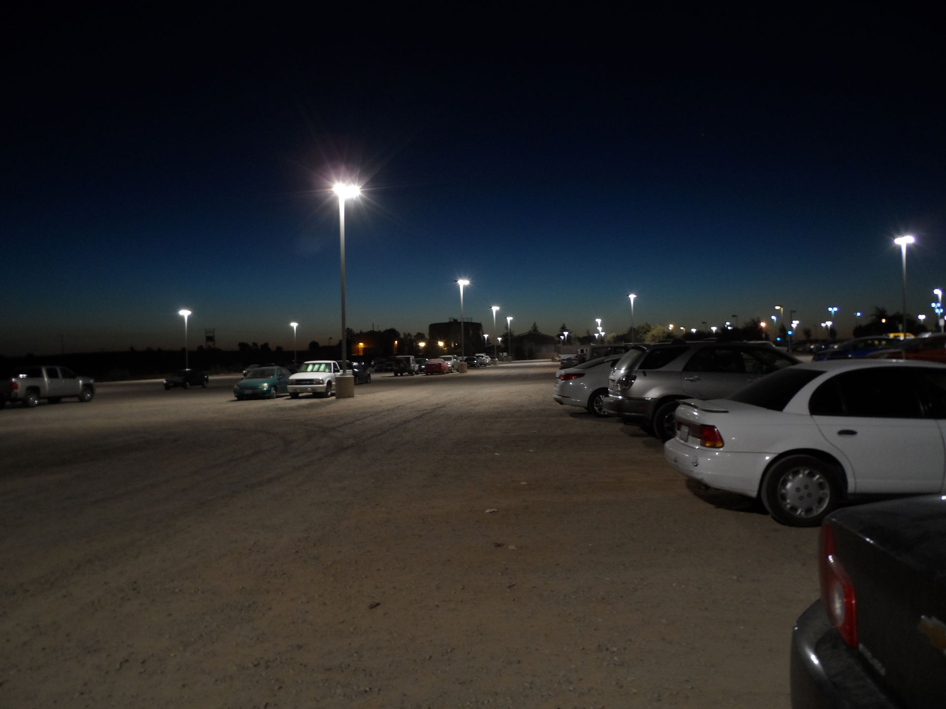 Merced, California. It's dark. The solar parking lot lighting w…