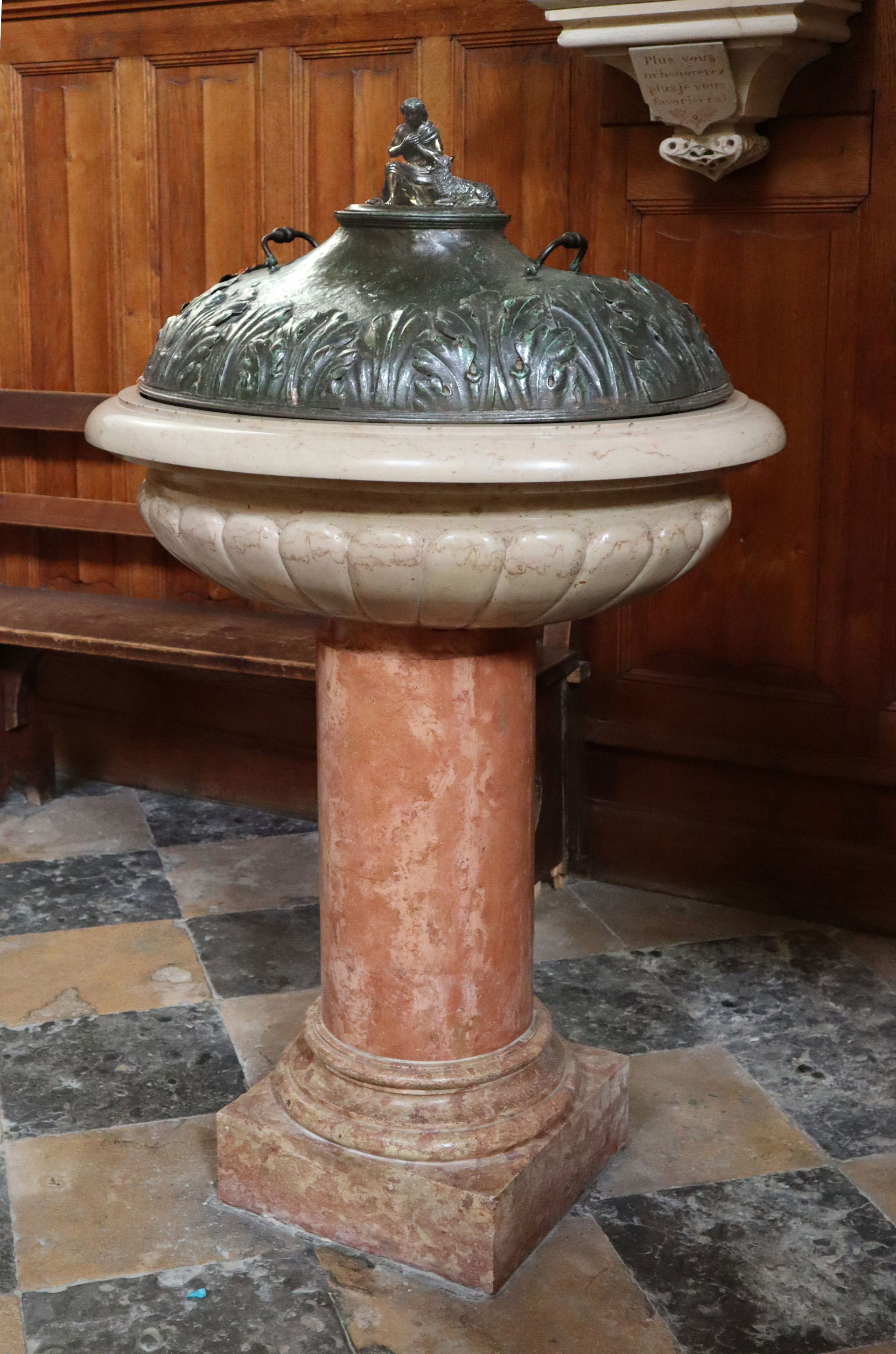 Baptismal font in Église Notre-Dame-des-Marais, Villefranche-su…