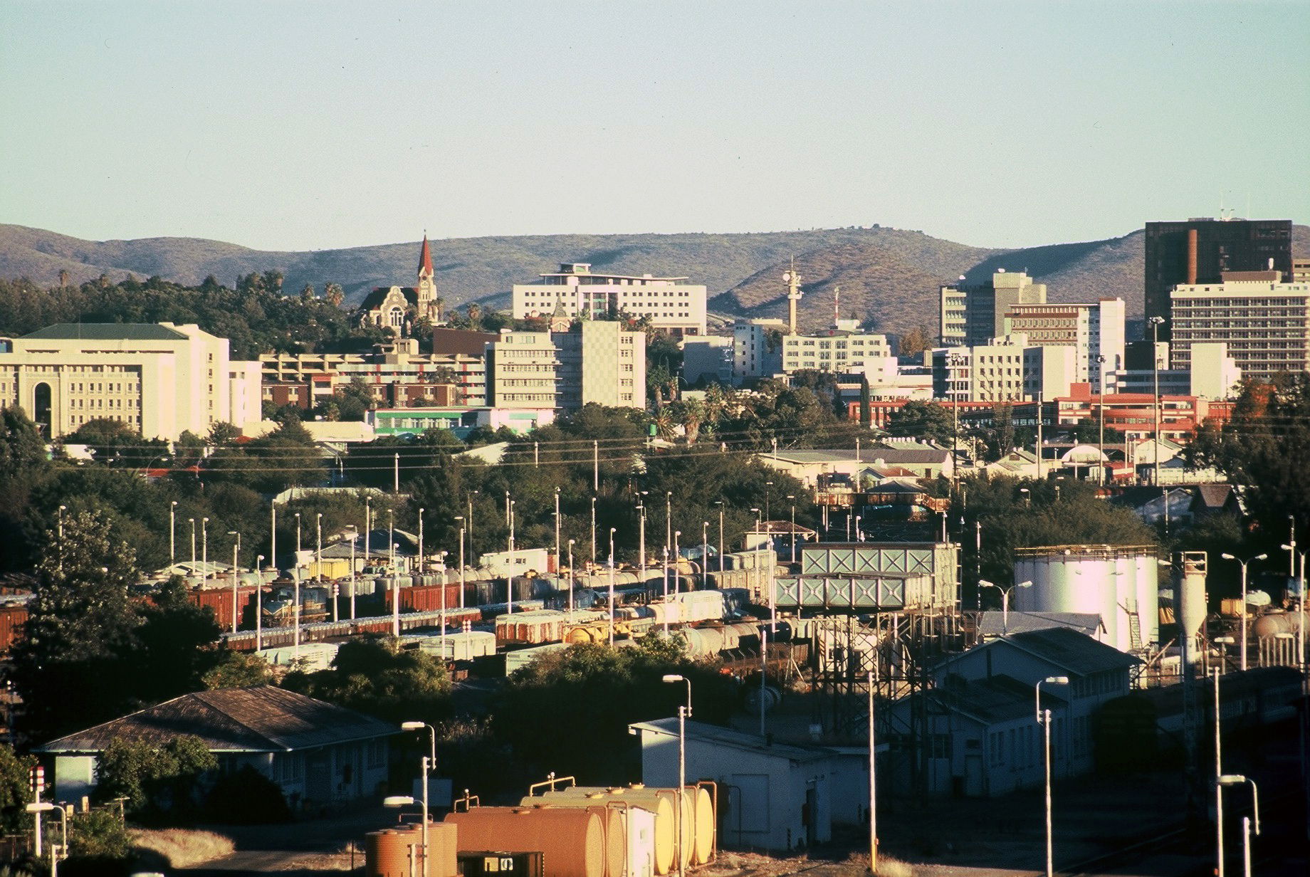 A picture of the skyline of Windhoek, Namibia. In the foregroun…