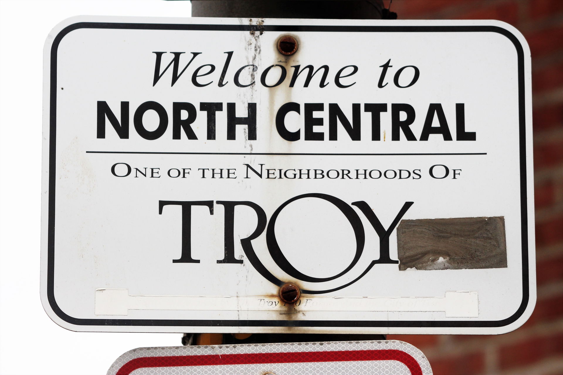A sign near Hoosick Street marking the North Central district o…