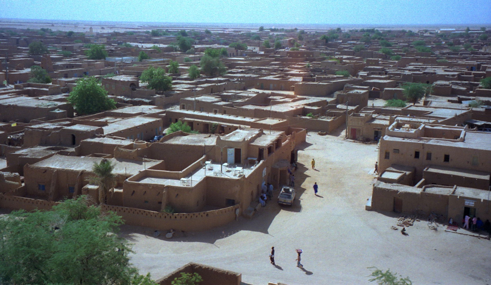View of Agadez, Niger from mosque minaret. In foreground, Hote…