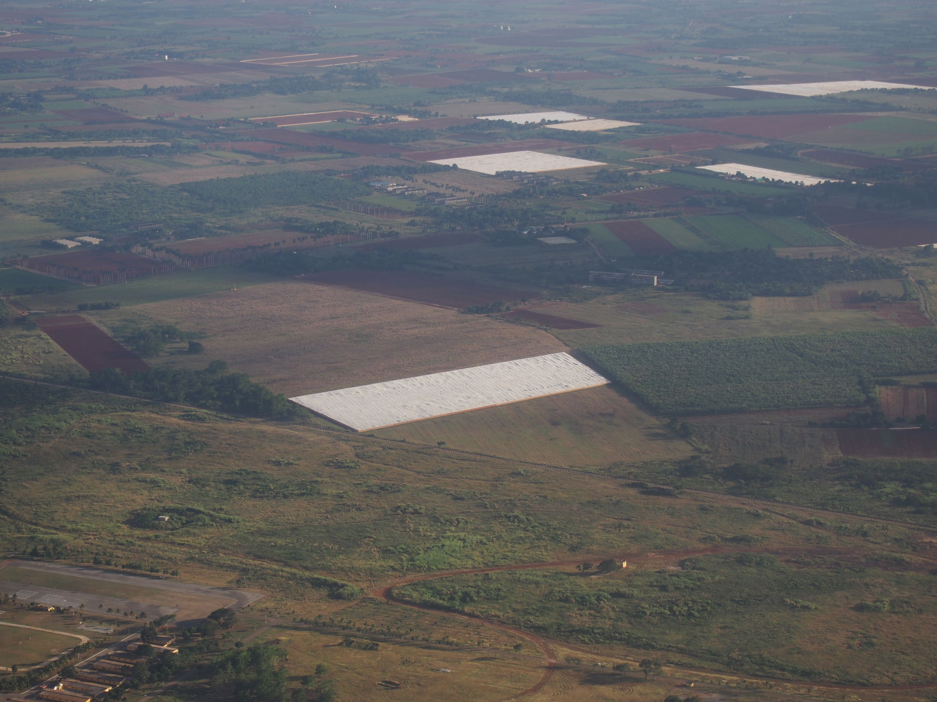 Artemisa Province, Cuba. The large white patches are tobacco fi…