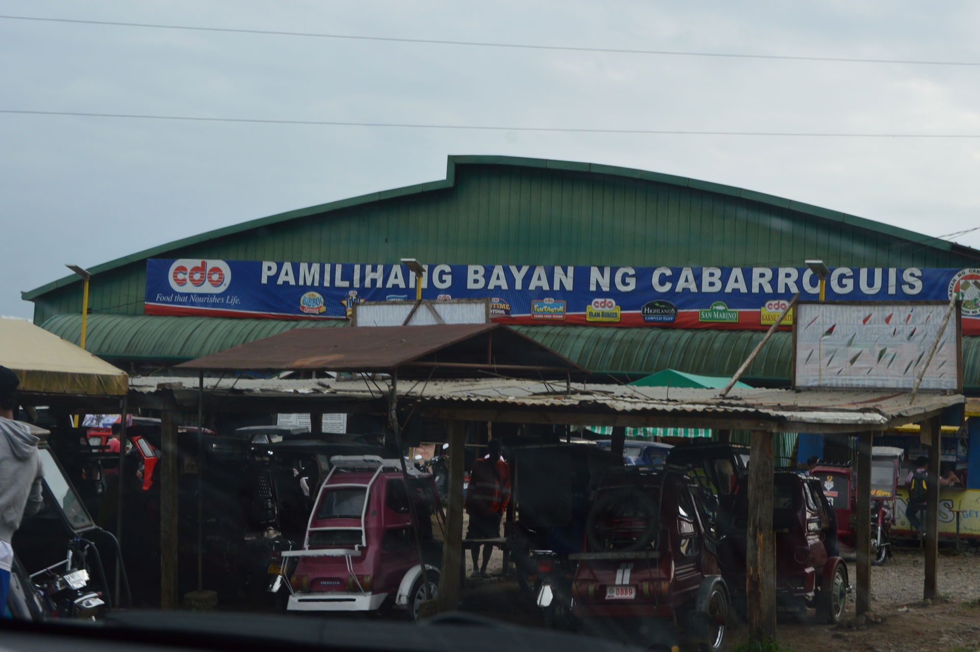 Photo shows the facade of the Cabarroguis Public Market in the …