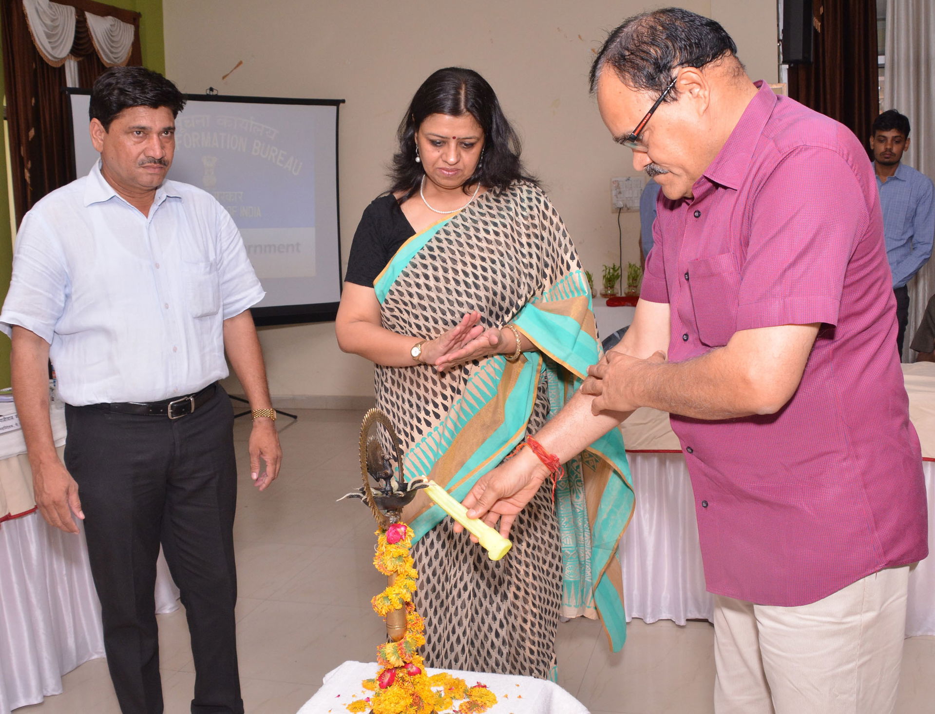 The District Collector, Shri K.C. Verma lighting the lamp to in…