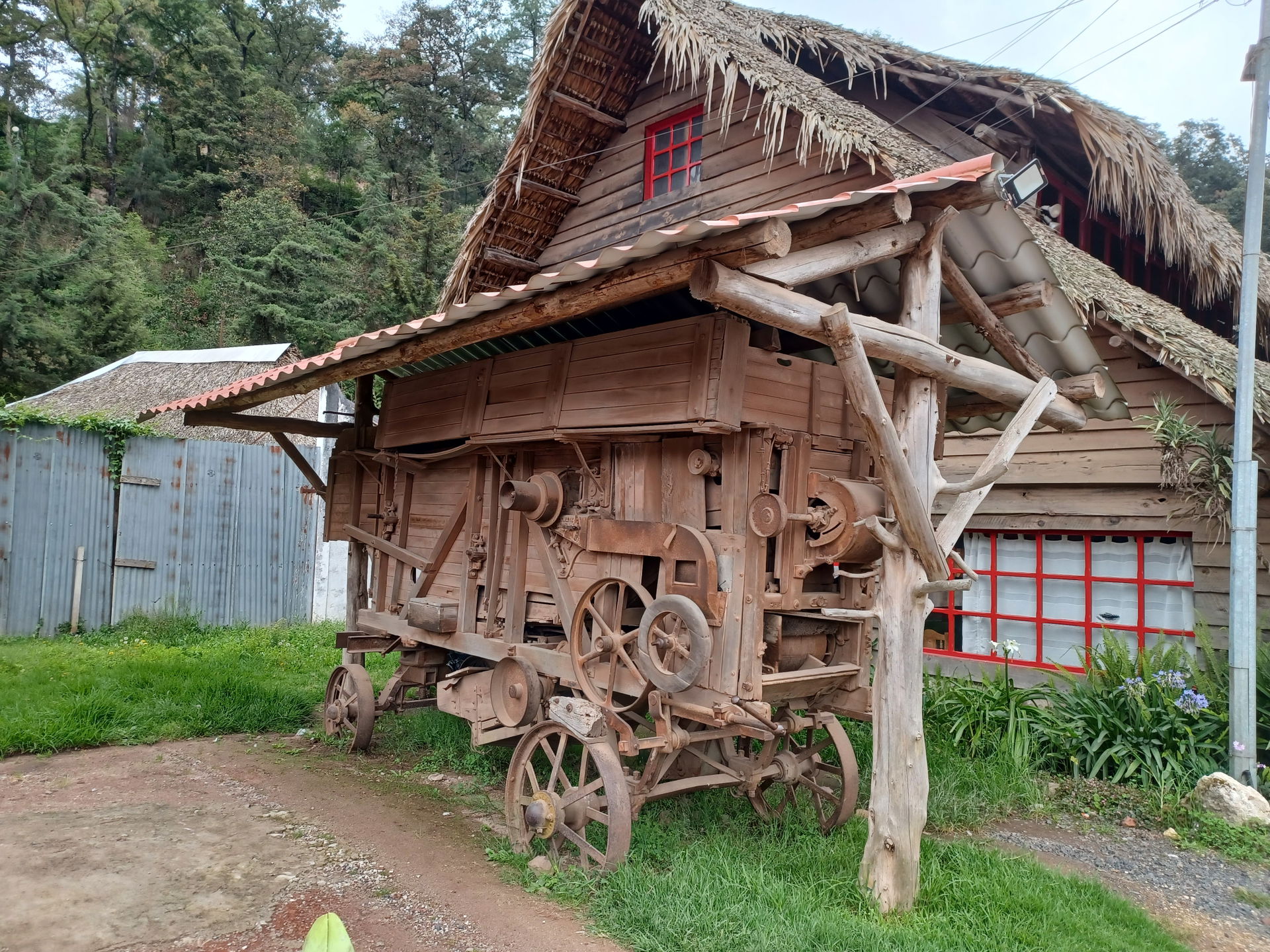 German-made Heinrich Lanz threshing machine outside the Katok r…
