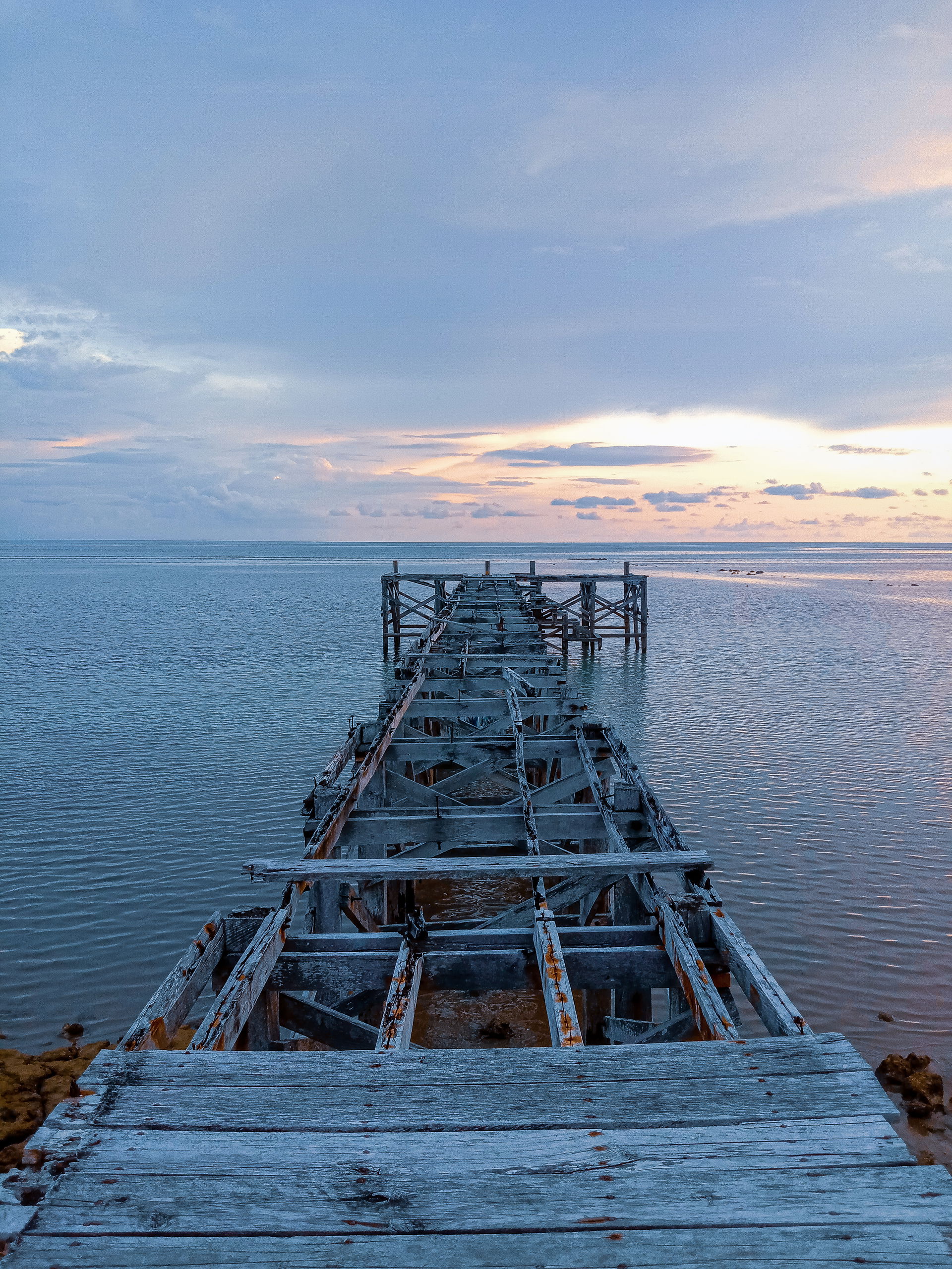 An untreated wooden pier located in Cinoki, Sarudu, Pasangkayu …
