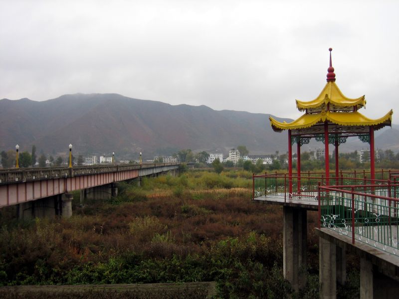 Looking over the border bridge into North Korea at the border t…