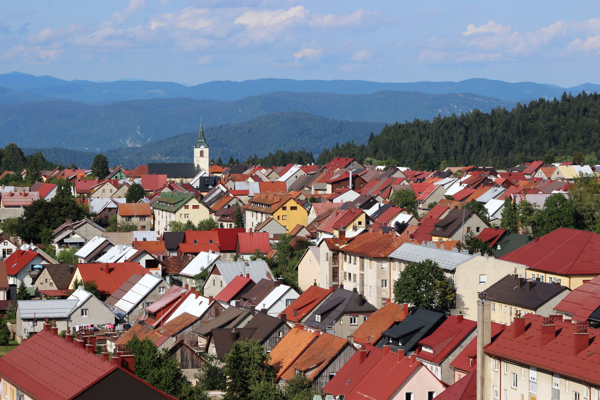A summer afternoon view of the town of Delnice, Croatia, from t…