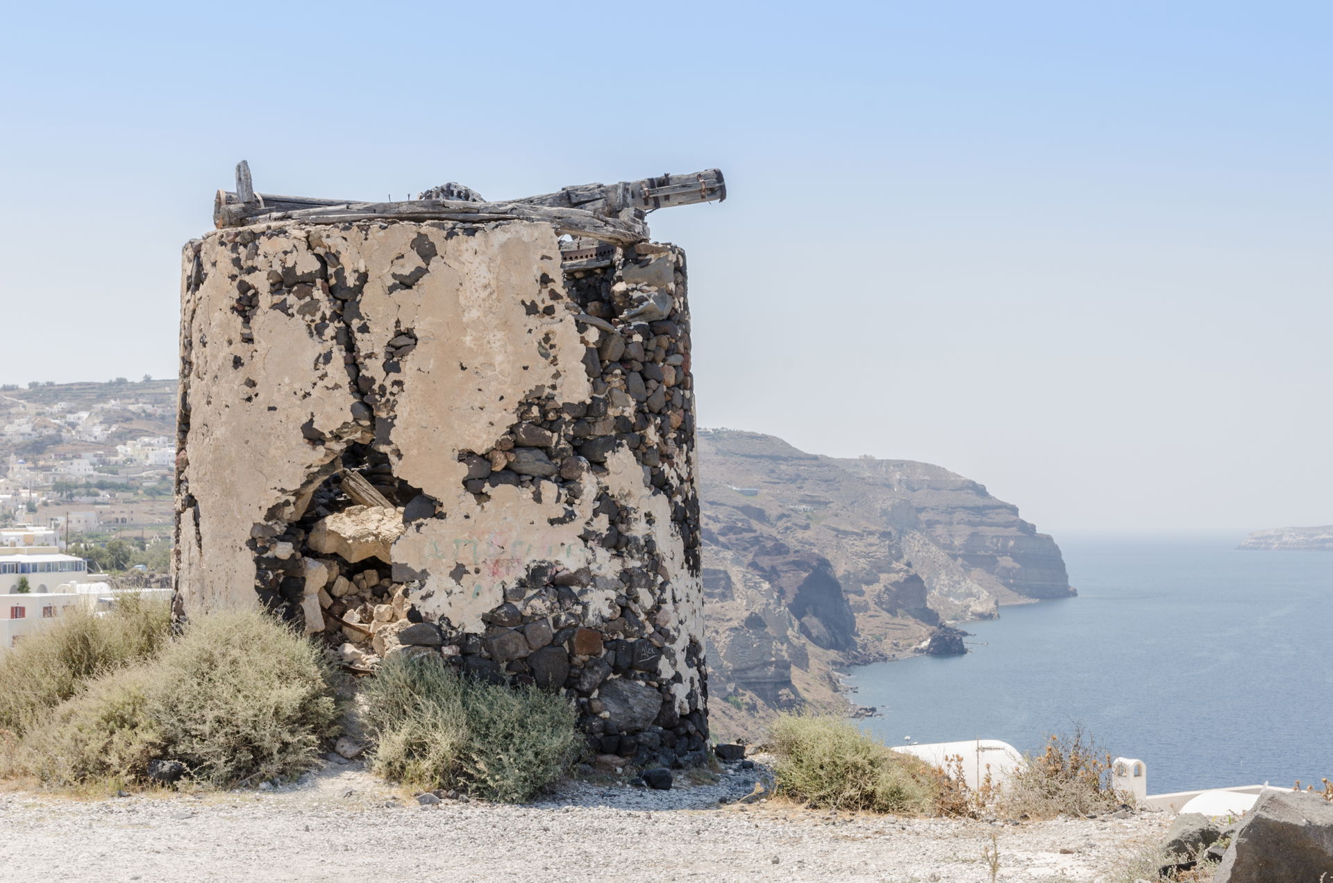 Remains of a windmill at the crater rim near Akrotiri, Santorin…